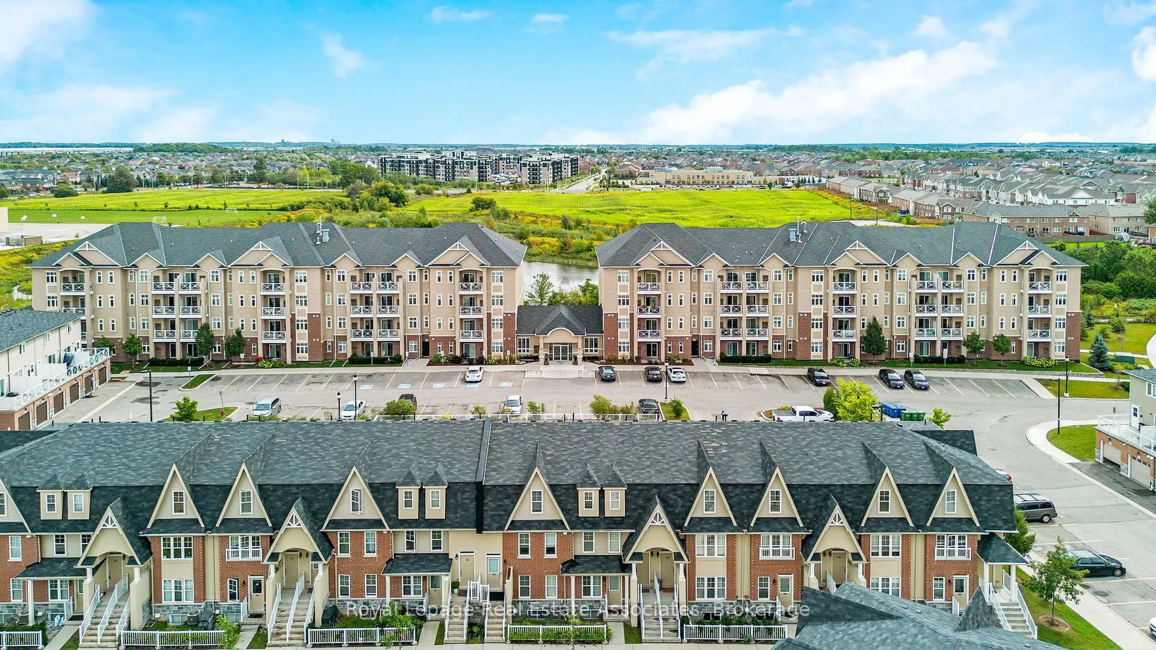 A pic from outside/outdoor area/front of a property/back of a property/a pic from drone, city buildings view from balcony for 1370 Costigan Rd #304, Milton Ontario L9T 0Y8