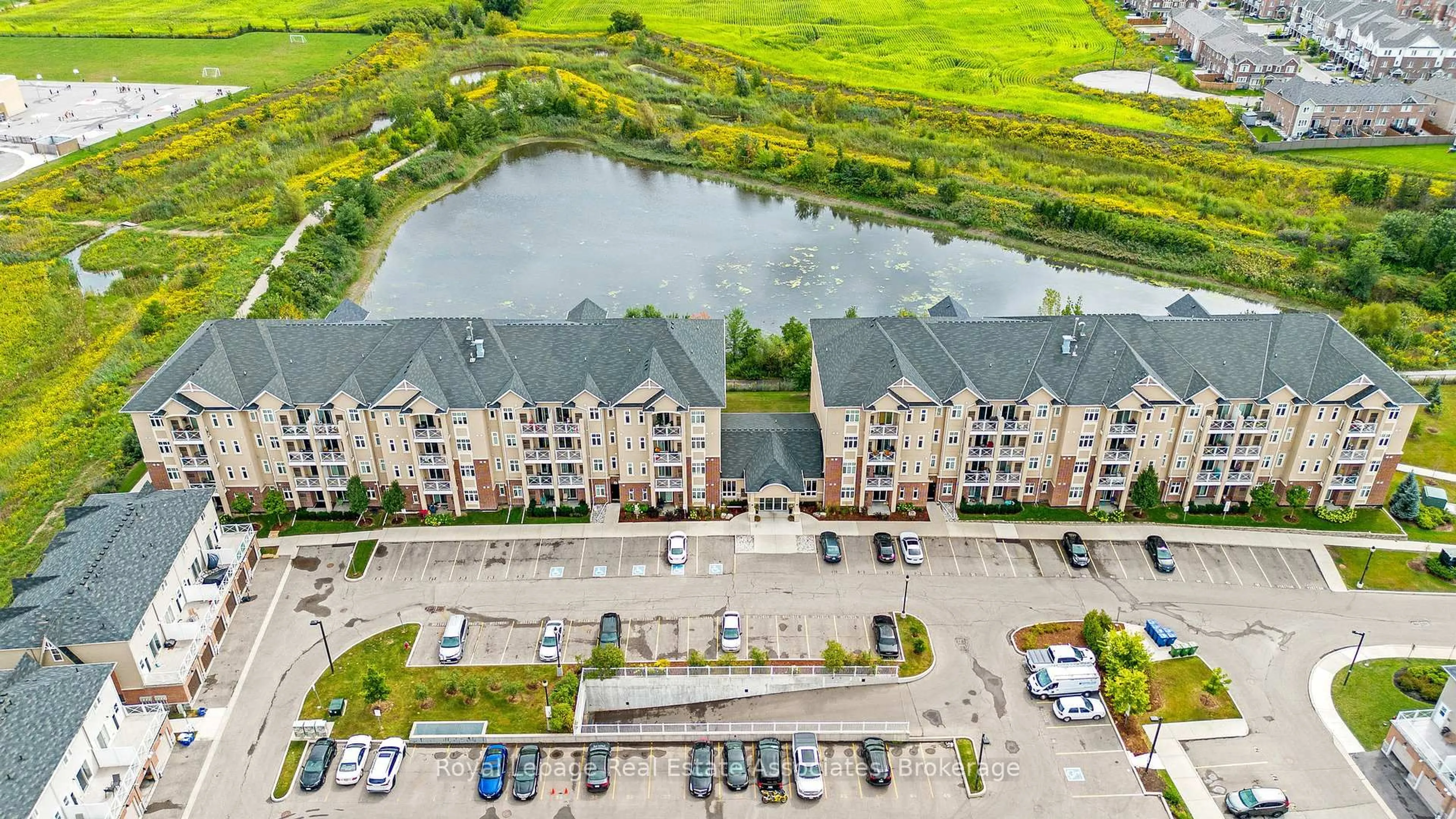 A pic from outside/outdoor area/front of a property/back of a property/a pic from drone, water/lake/river/ocean view for 1370 Costigan Rd #304, Milton Ontario L9T 0Y8