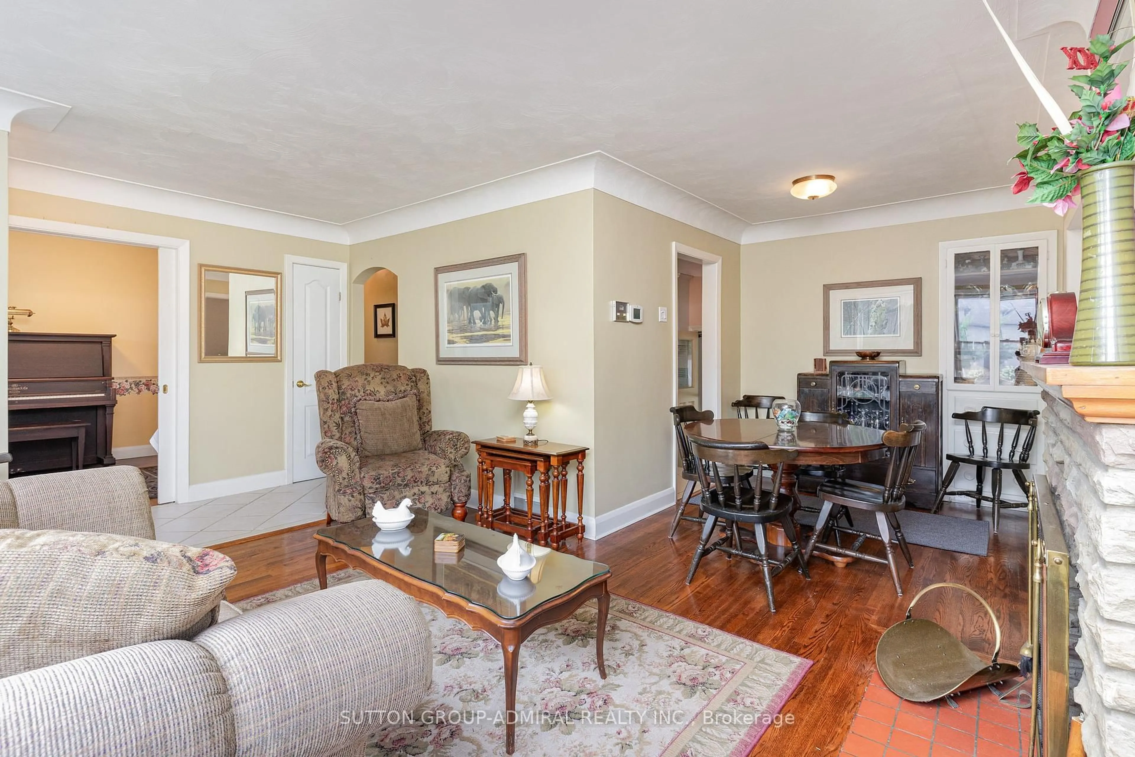 Living room with furniture, wood/laminate floor for 2455 Rebecca St, Oakville Ontario L6L 2B1