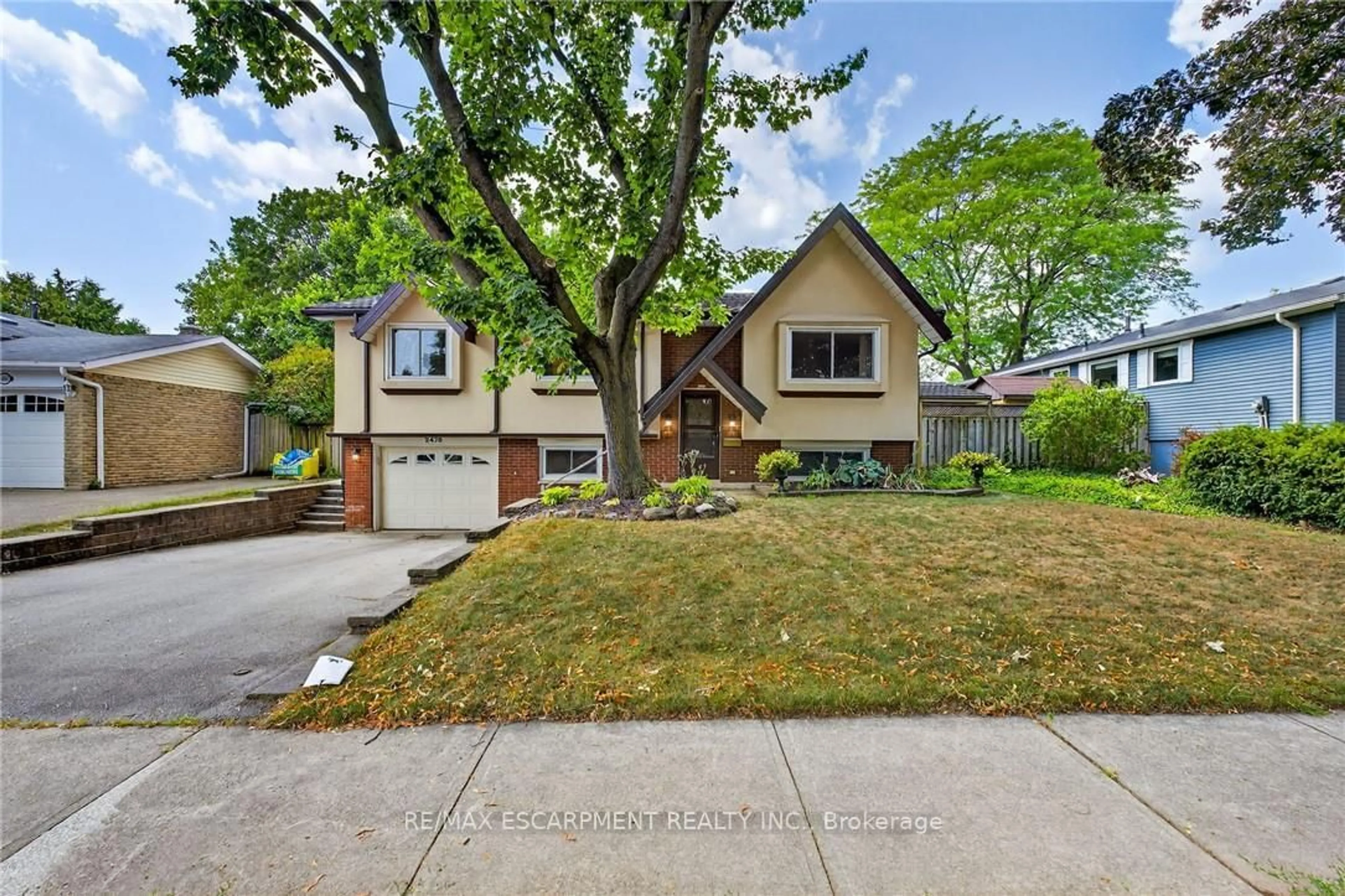 Home with brick exterior material, street for 2479 Bridge Rd, Oakville Ontario L6L 2H3