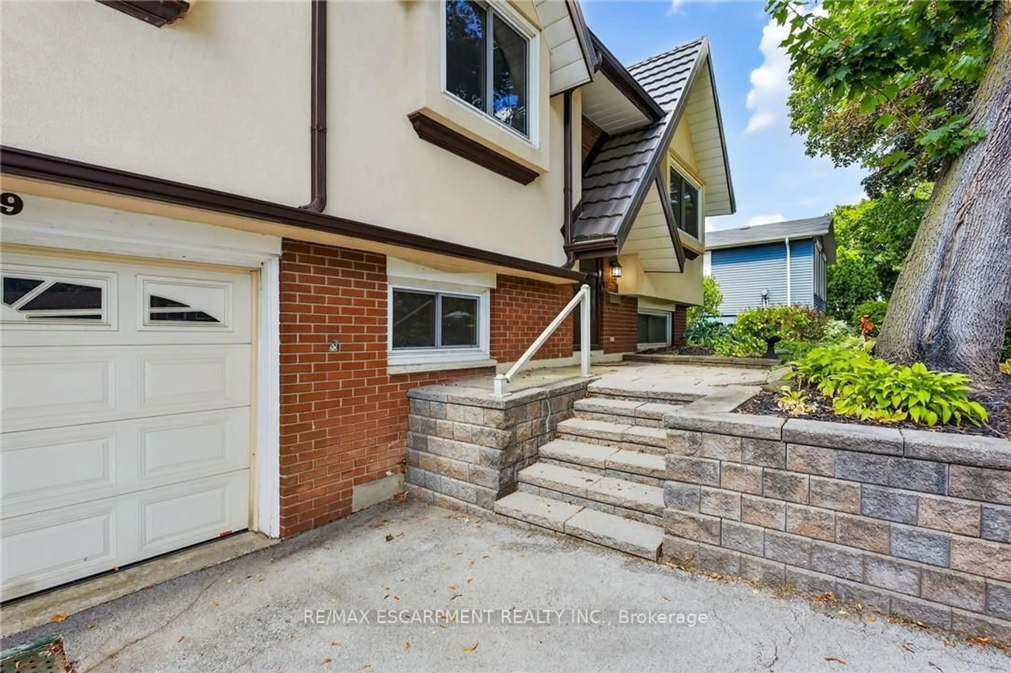 Home with brick exterior material, street for 2479 Bridge Rd, Oakville Ontario L6L 2H3
