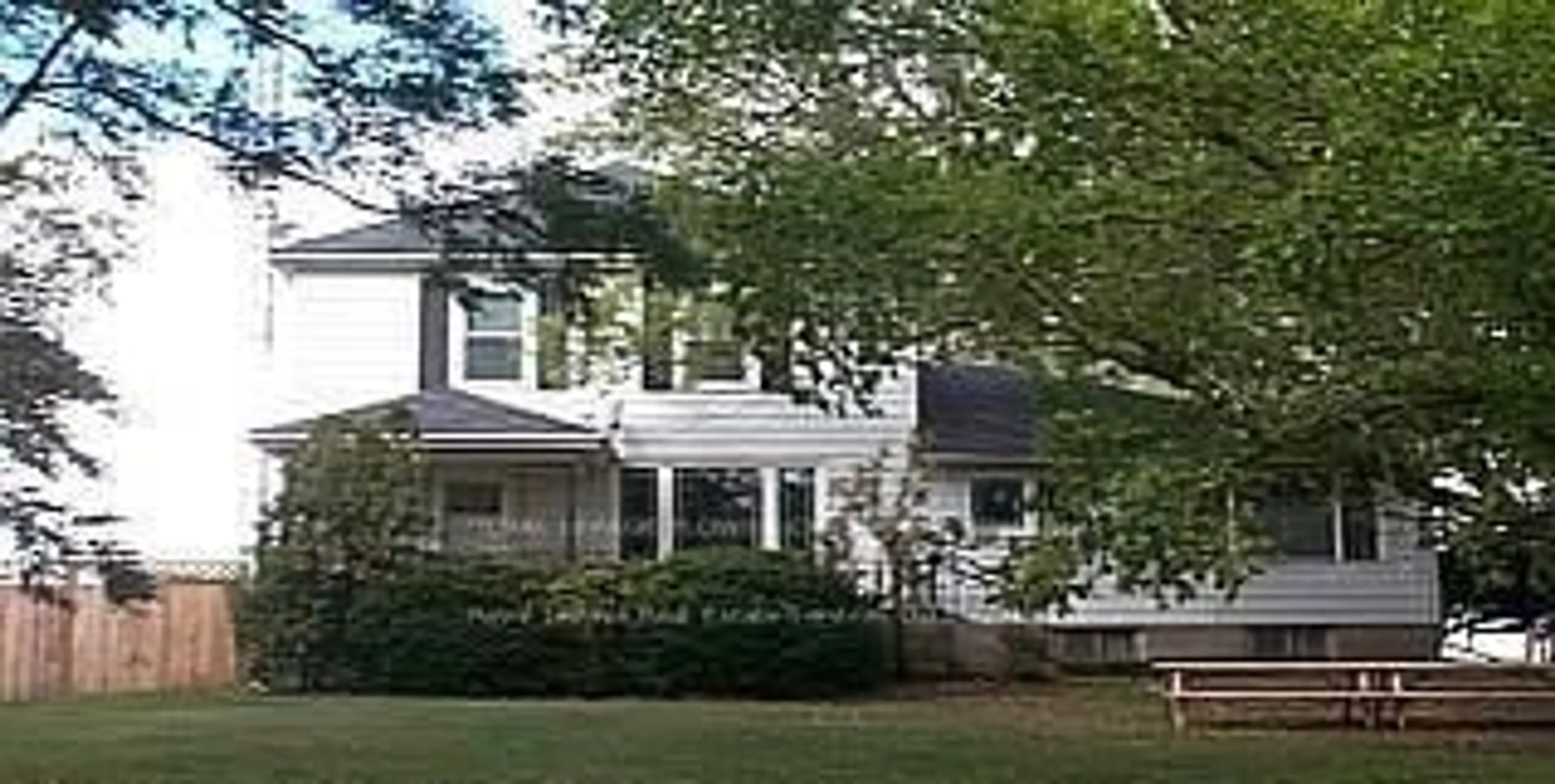 Home with vinyl exterior material, street for 2483 Burnhamthorpe Rd, Oakville Ontario L6M 4H1
