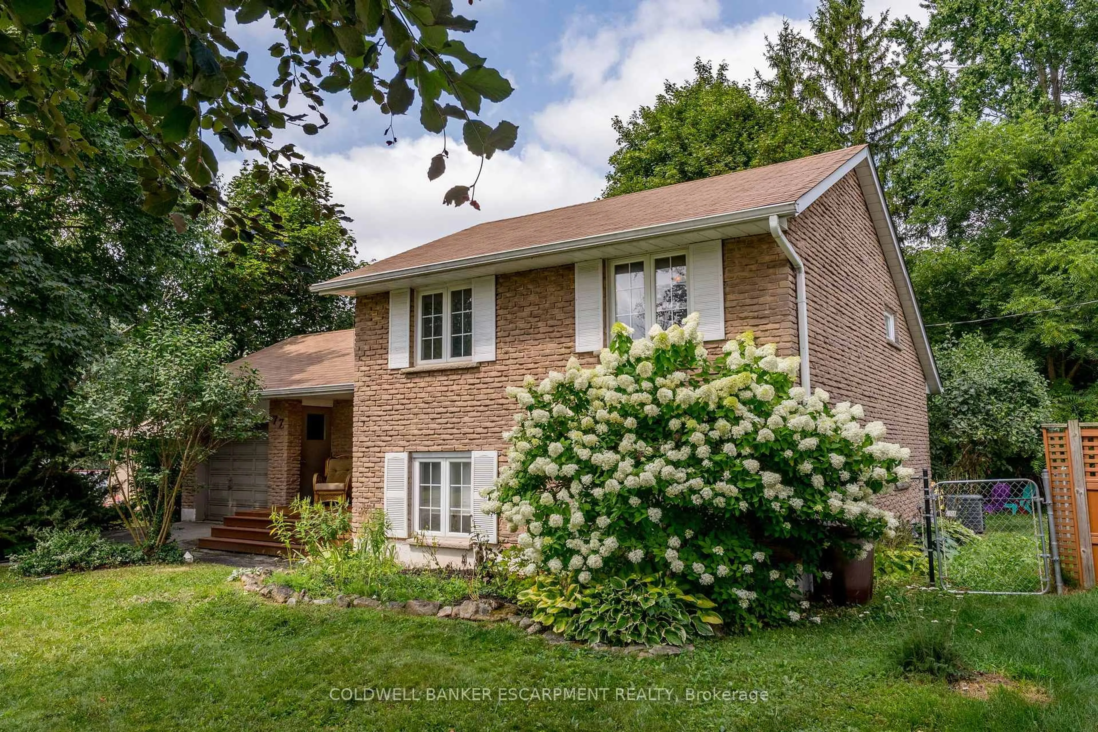 Home with brick exterior material, street for 77 Elizabeth Dr, Halton Hills Ontario L7J 1B4