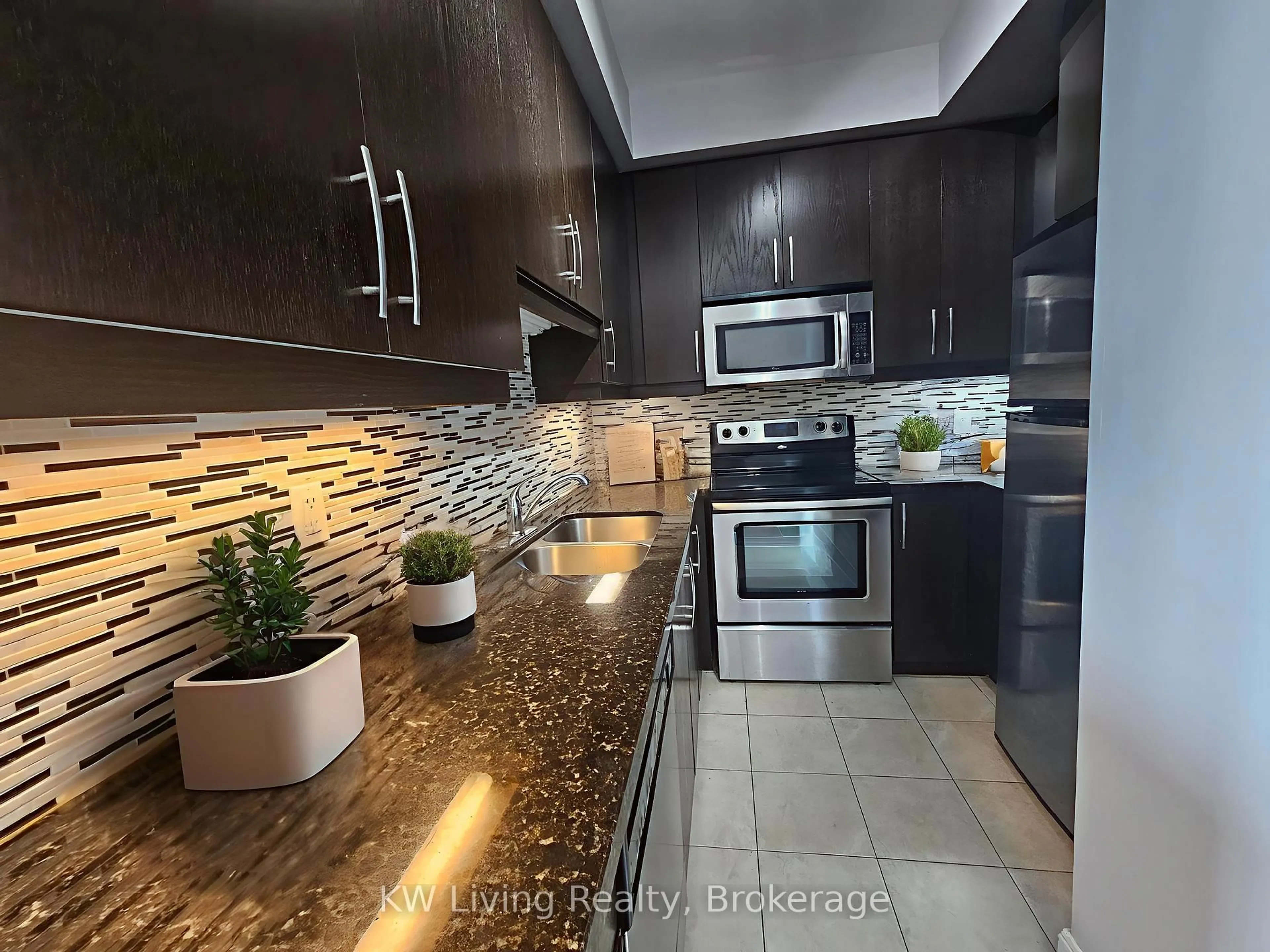 Open concept kitchen, ceramic/tile floor for 60 Absolute Ave #4804, Mississauga Ontario L4Z 0A9