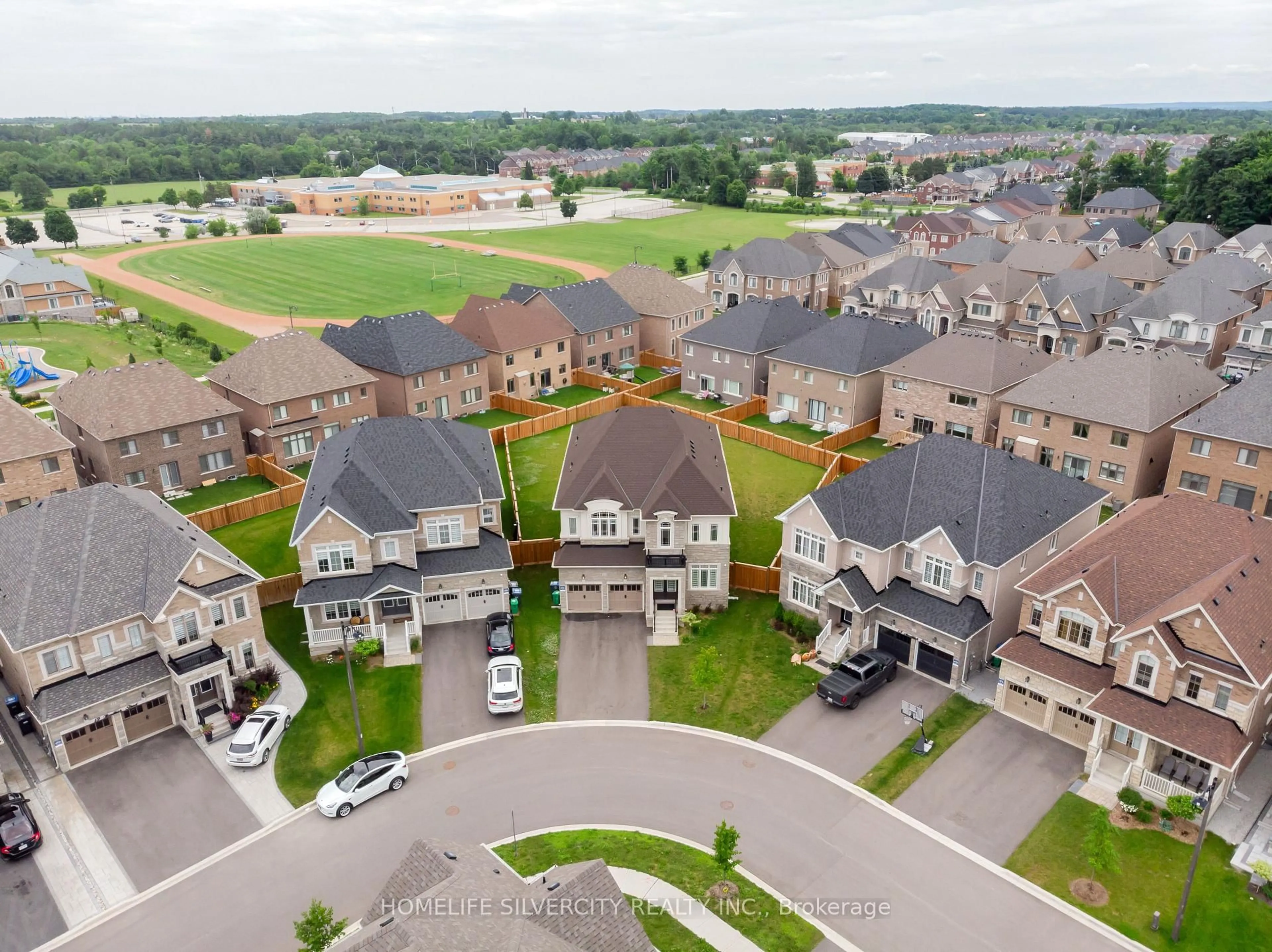 A pic from outside/outdoor area/front of a property/back of a property/a pic from drone, unknown for 15 Moonstruck St, Caledon Ontario L7C 3A3