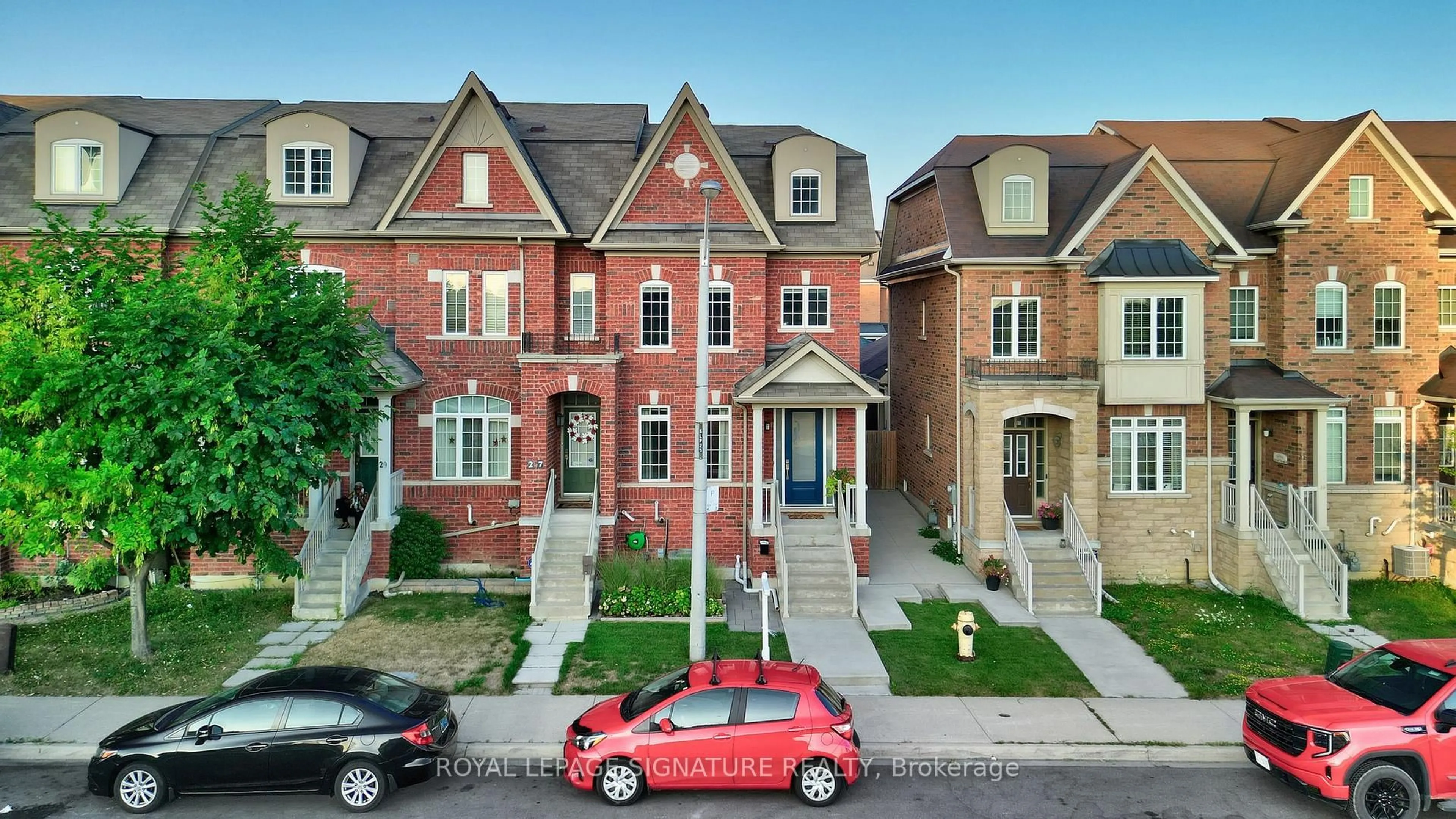 Home with brick exterior material, street for 25 Charlie Jordan Rd, Toronto Ontario M9M 0B7