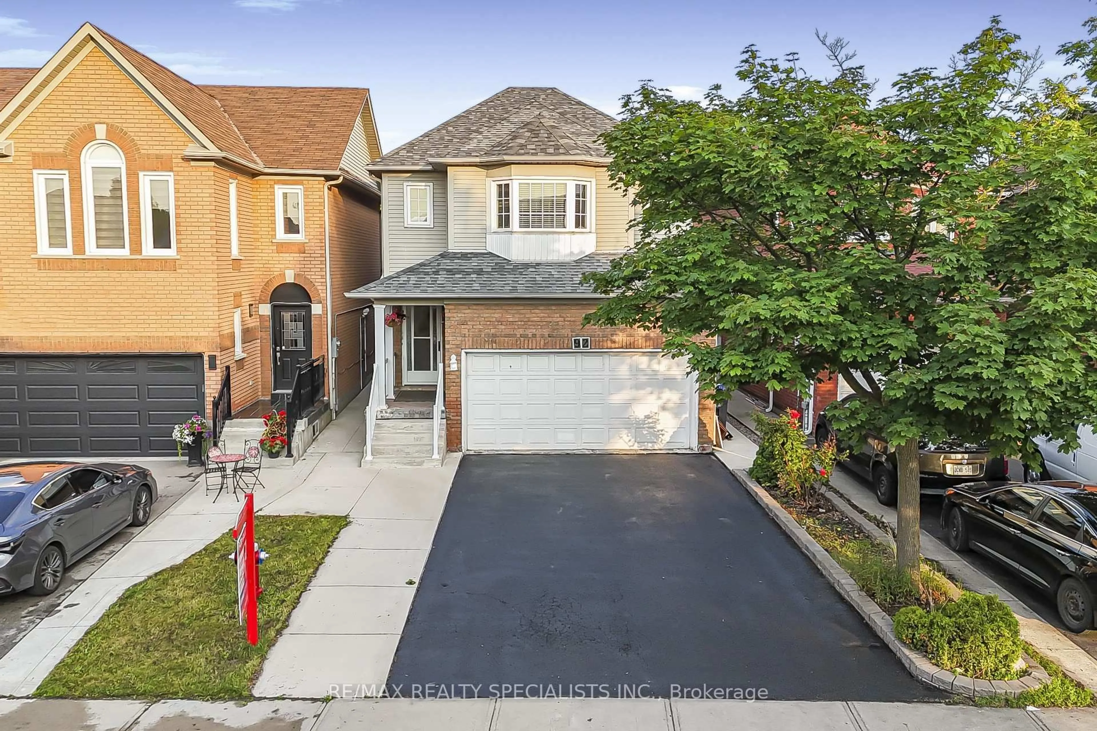 Home with brick exterior material, street for 92 Black Oak Dr, Brampton Ontario L6R 1B8