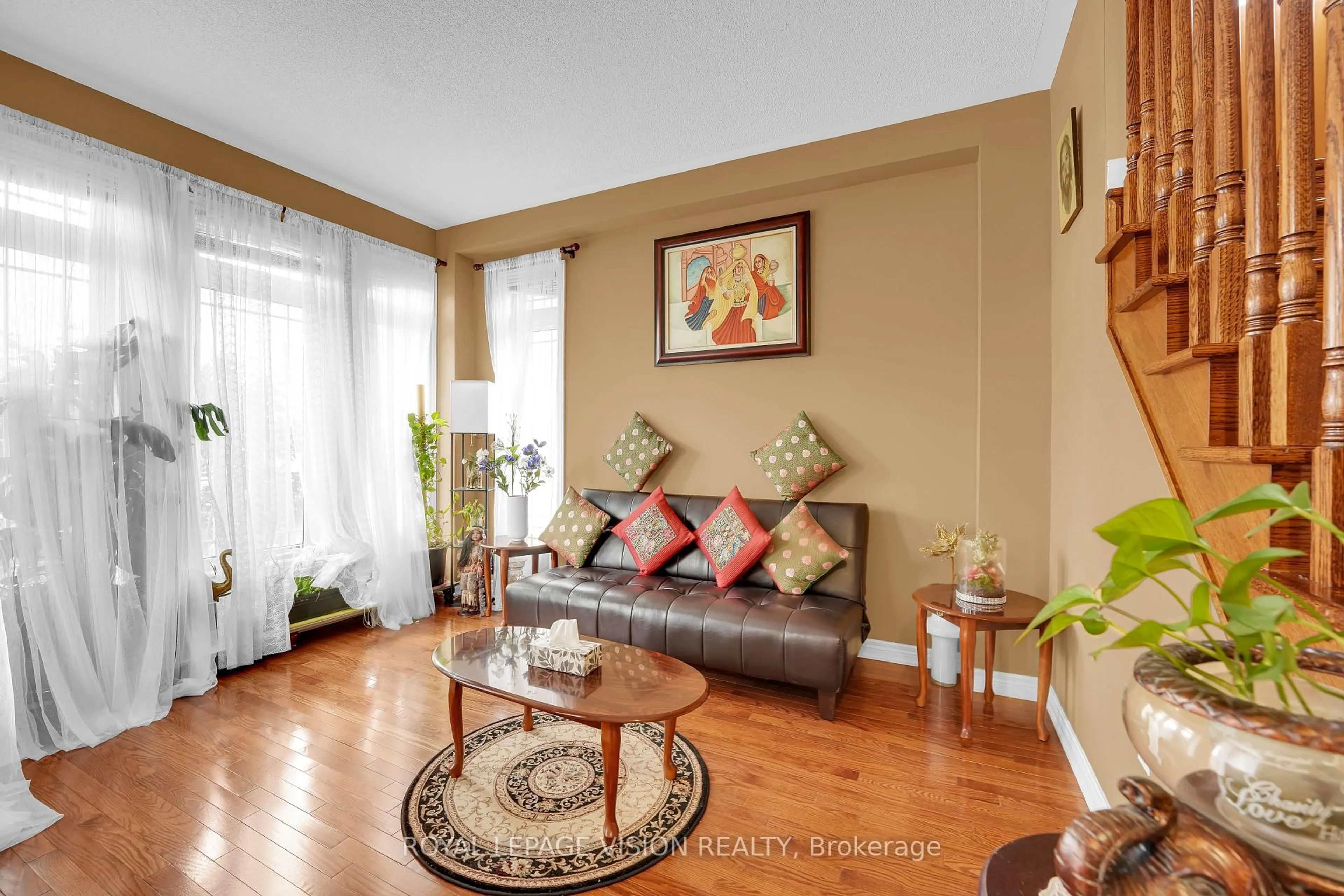 Living room with furniture, unknown for 16 Putnam Dr, Brampton Ontario L7A 3S4