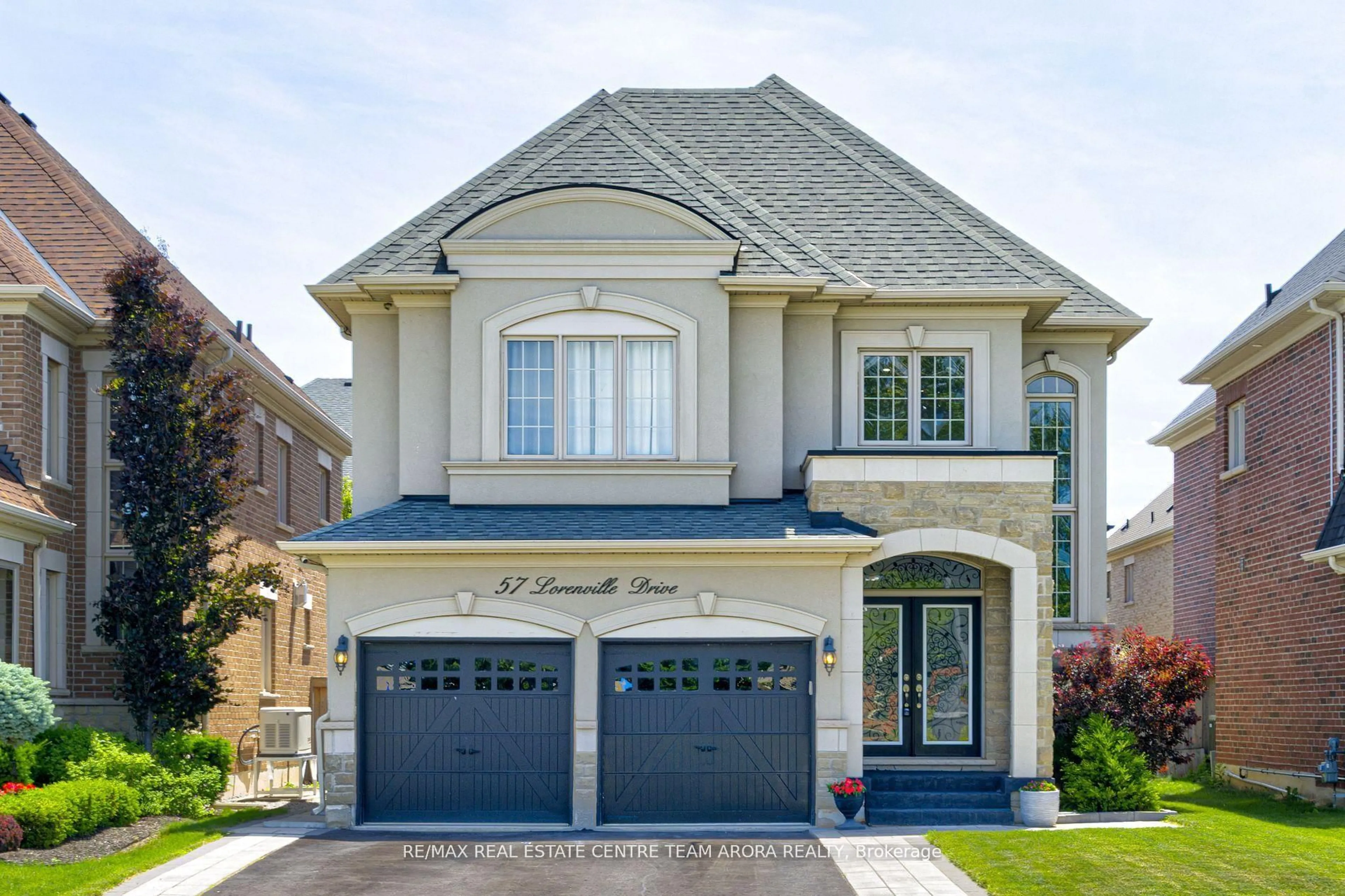 Home with brick exterior material, street for 57 Lorenville Dr, Brampton Ontario L6X 3A5