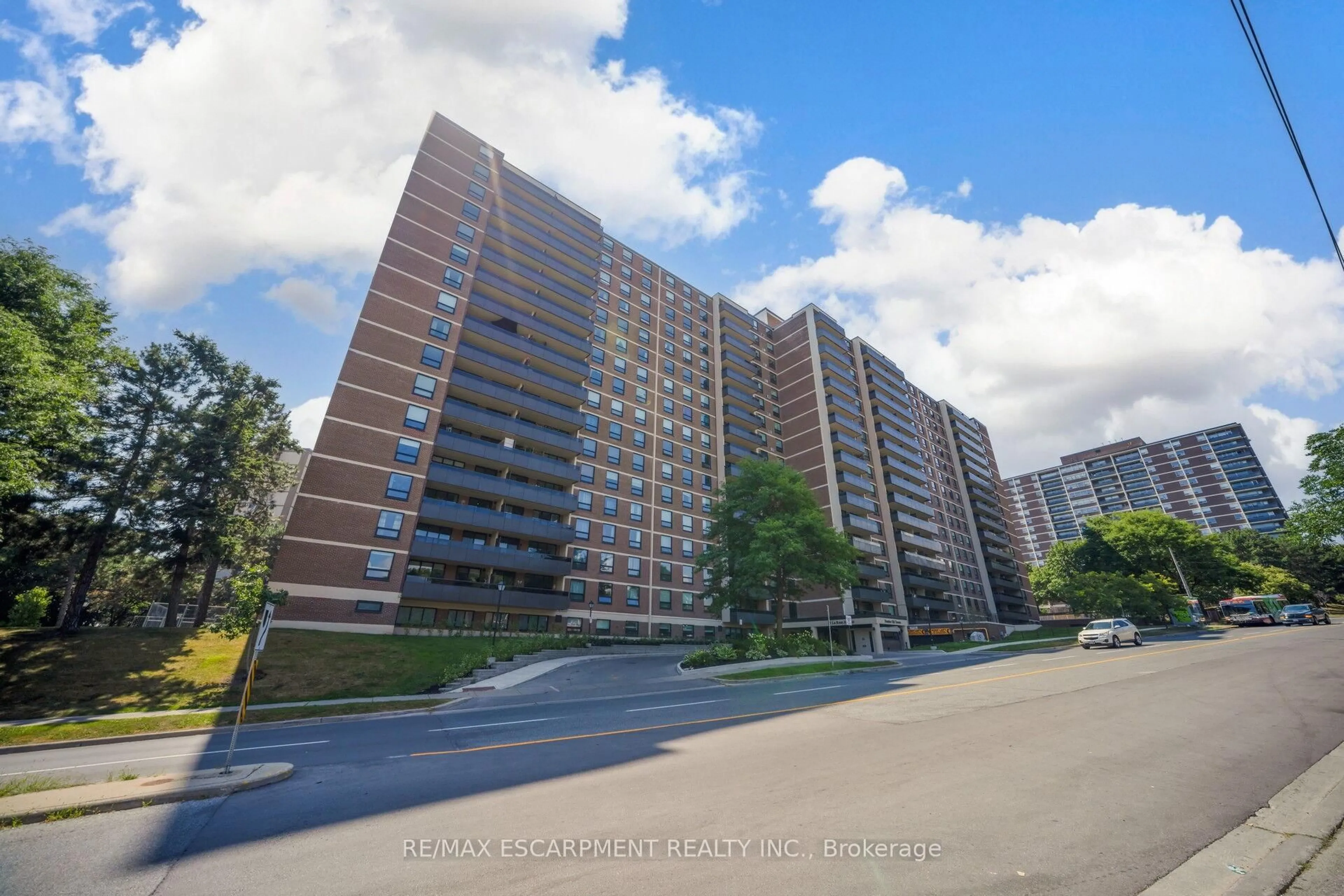A pic from outside/outdoor area/front of a property/back of a property/a pic from drone, street for 15 La Rose Ave #1403, Toronto Ontario M9P 1A7
