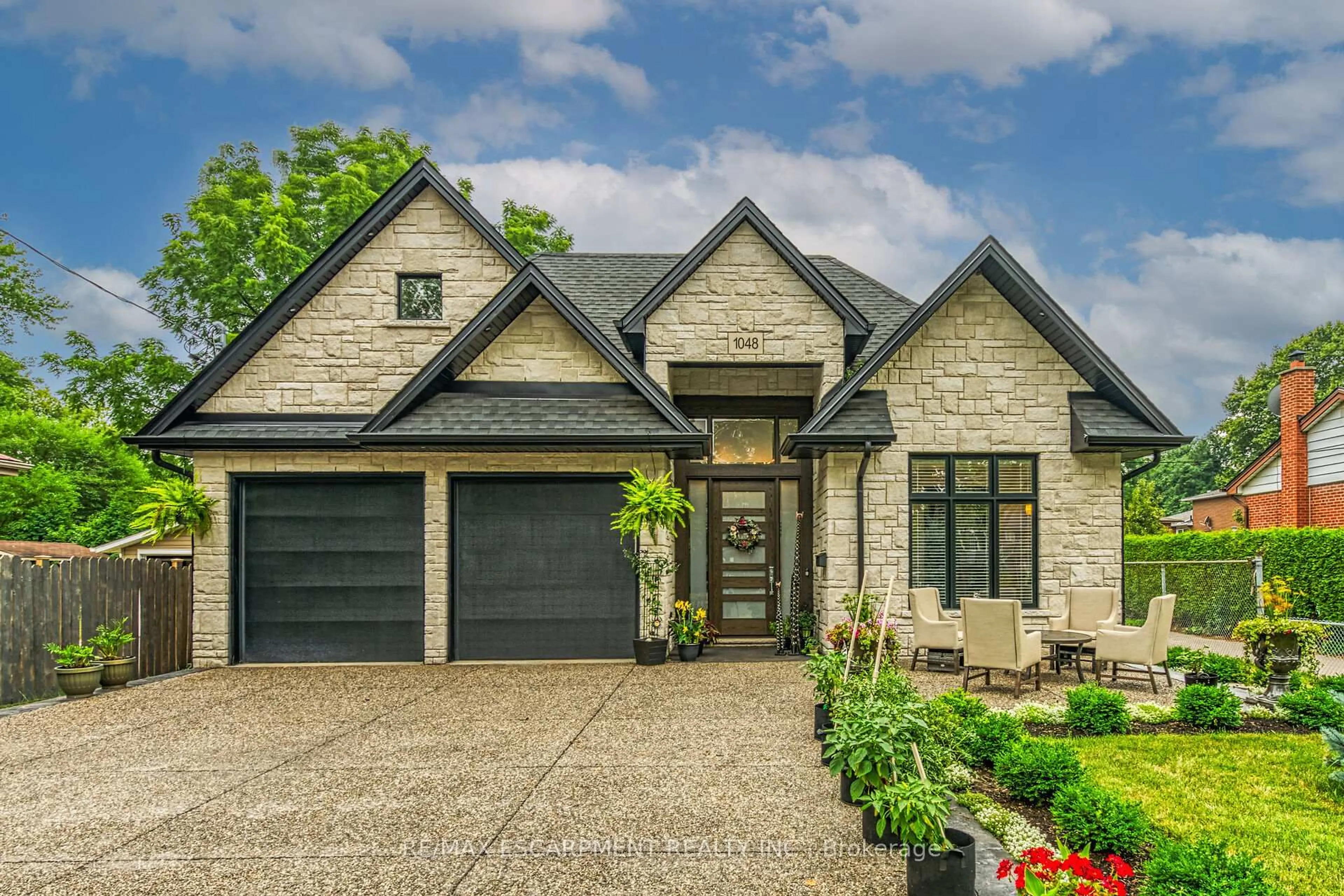 Home with brick exterior material, street for 1048 Dovercourt Ave, Burlington Ontario L7T 3C2