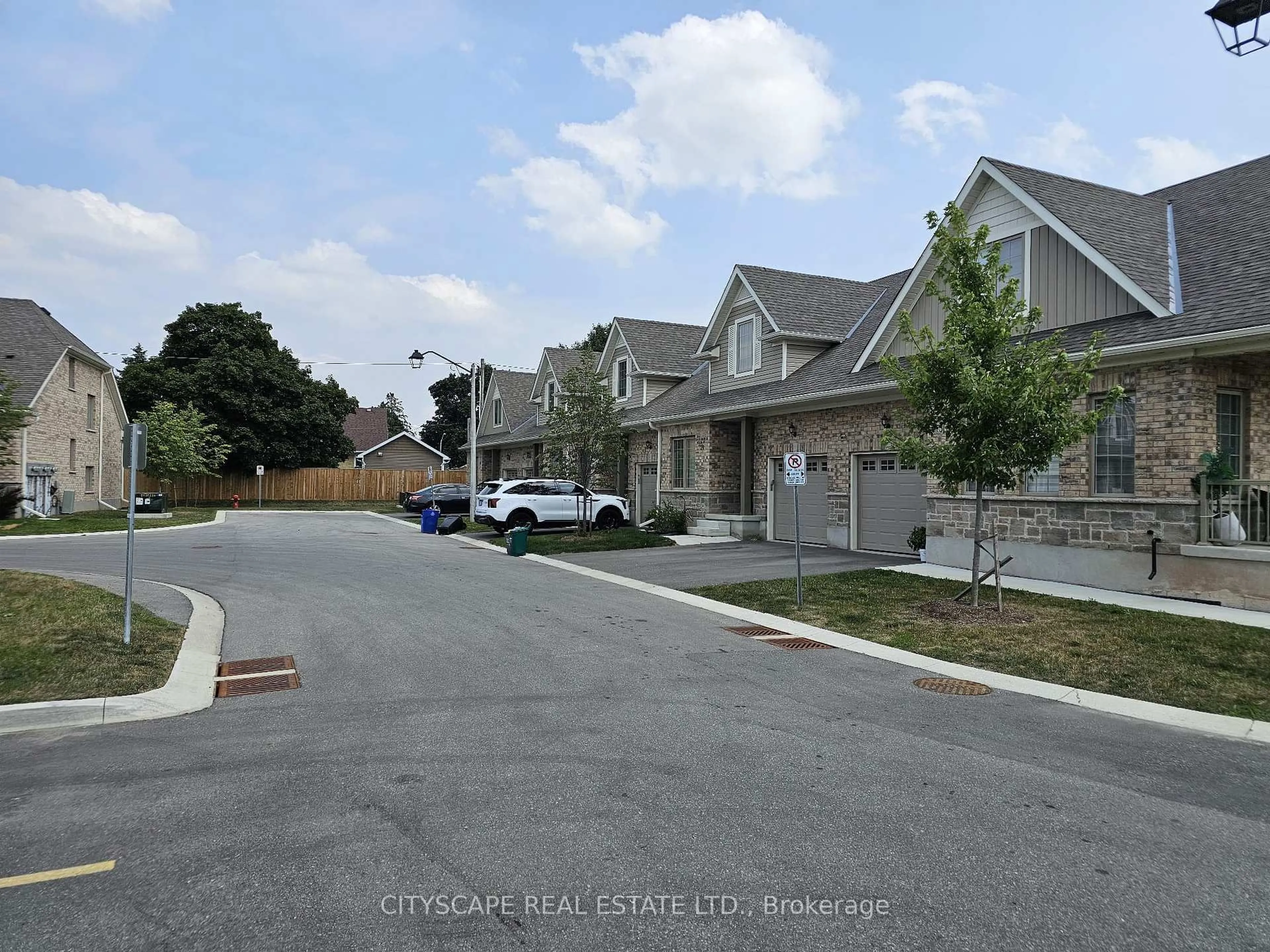 A pic from outside/outdoor area/front of a property/back of a property/a pic from drone, street for 25 Braida Lane, Halton Hills Ontario L7J 0B7