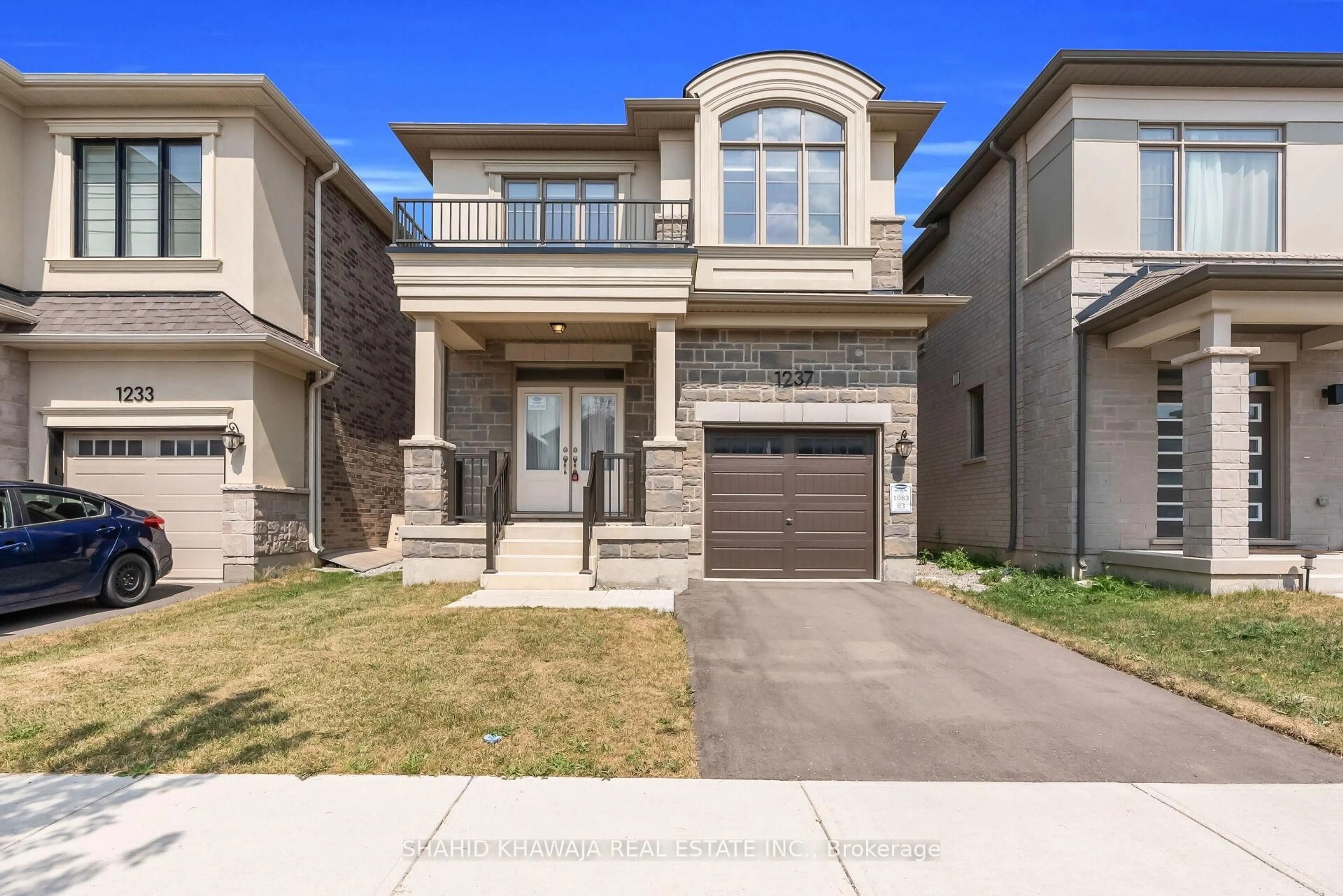 Home with brick exterior material, street for 1237 Trudeau Dr, Milton Ontario L9E 1Y6