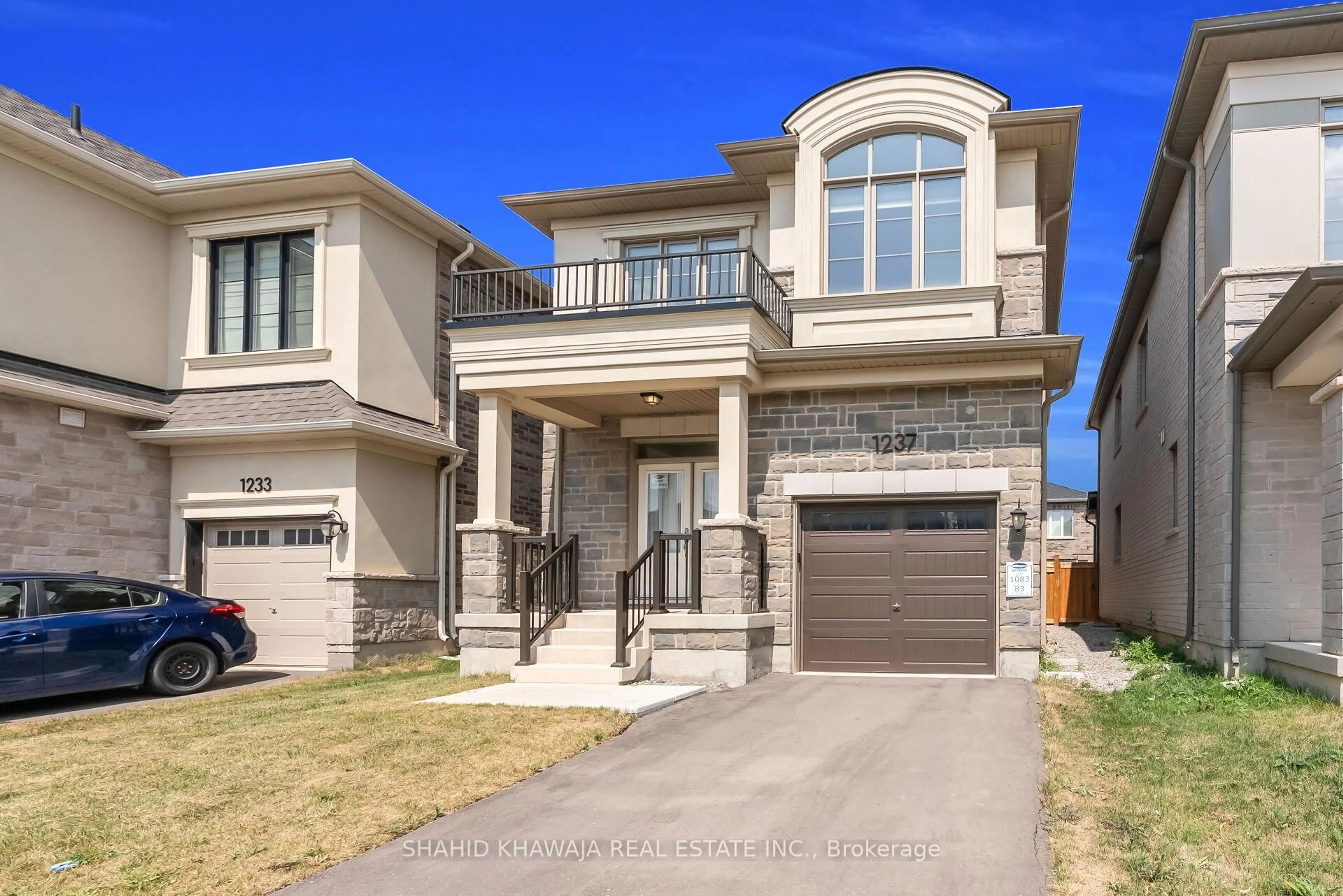 Home with brick exterior material, street for 1237 Trudeau Dr, Milton Ontario L9E 1Y6