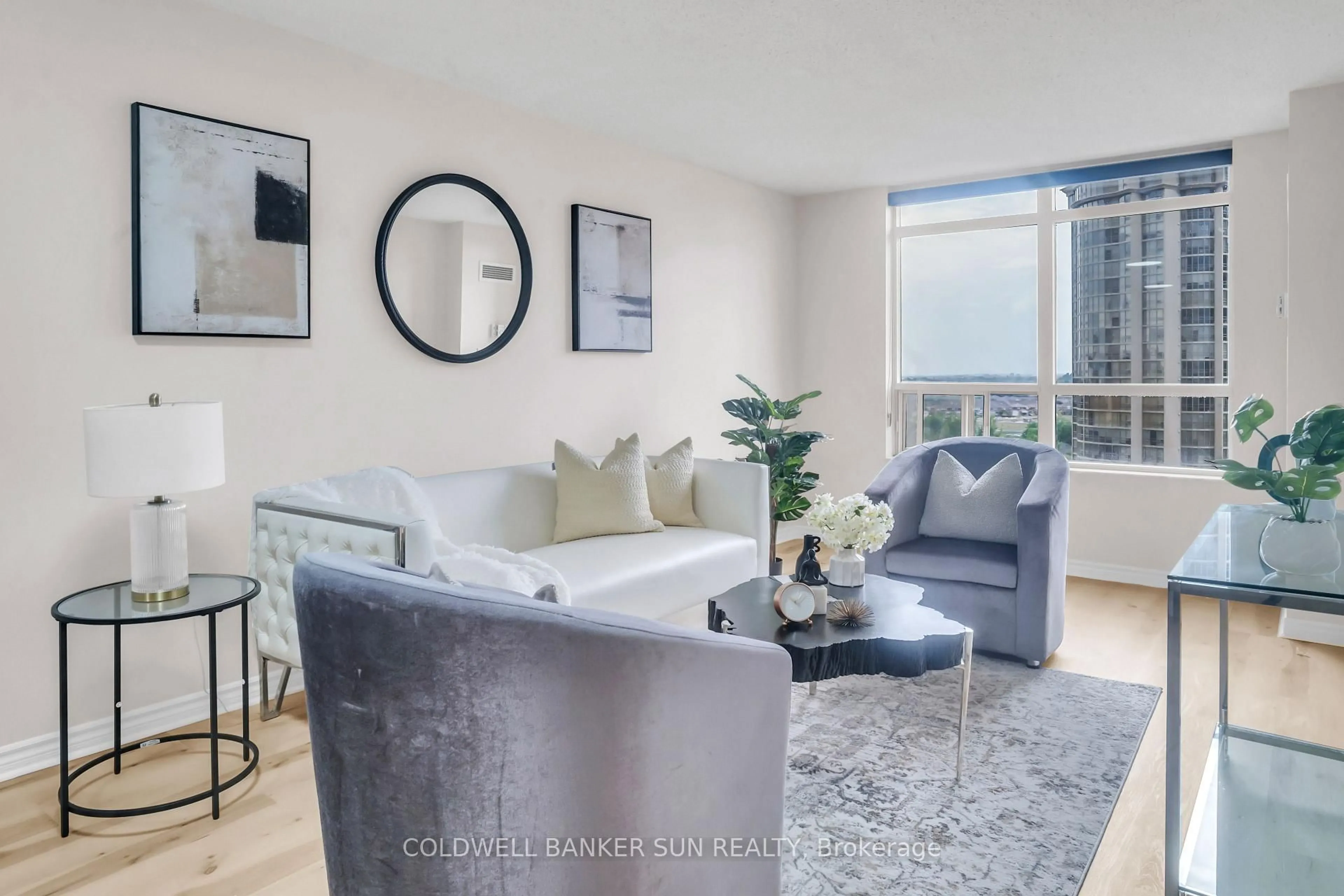 Living room with furniture, unknown for 35 Kingsbridge Garden Circ #1104, Mississauga Ontario L5R 3Z5