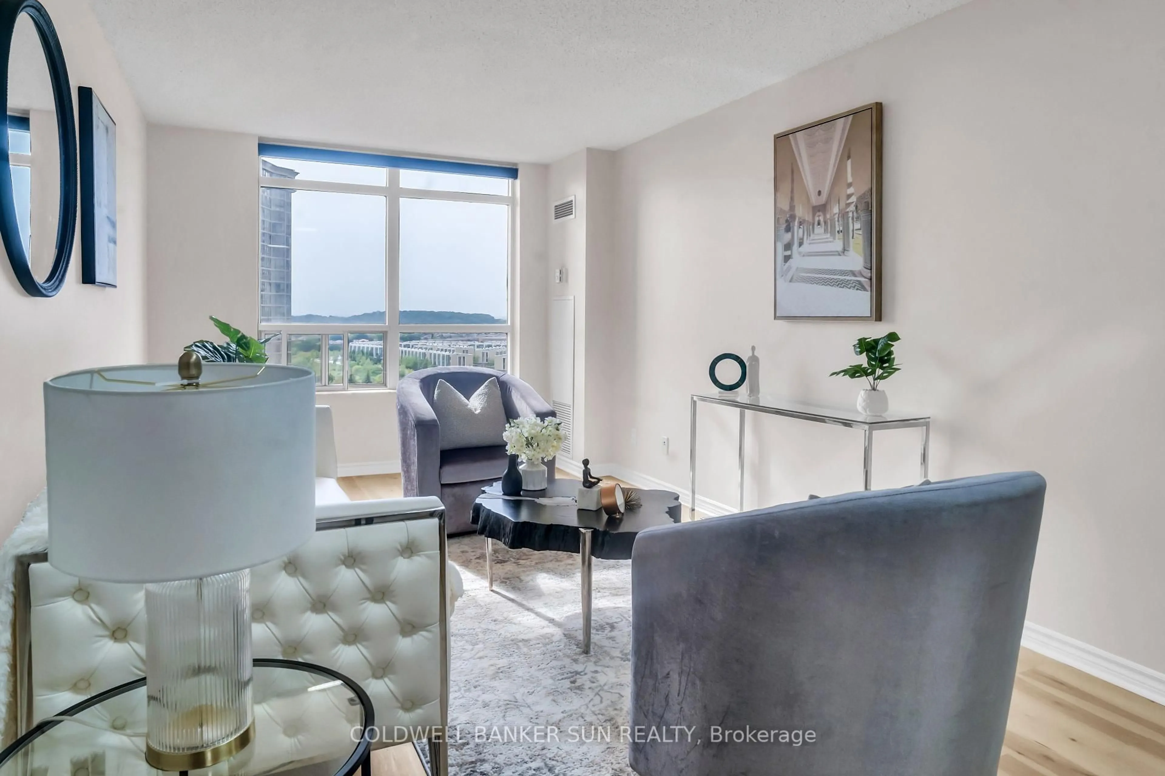 Living room with furniture, unknown for 35 Kingsbridge Garden Circ #1104, Mississauga Ontario L5R 3Z5