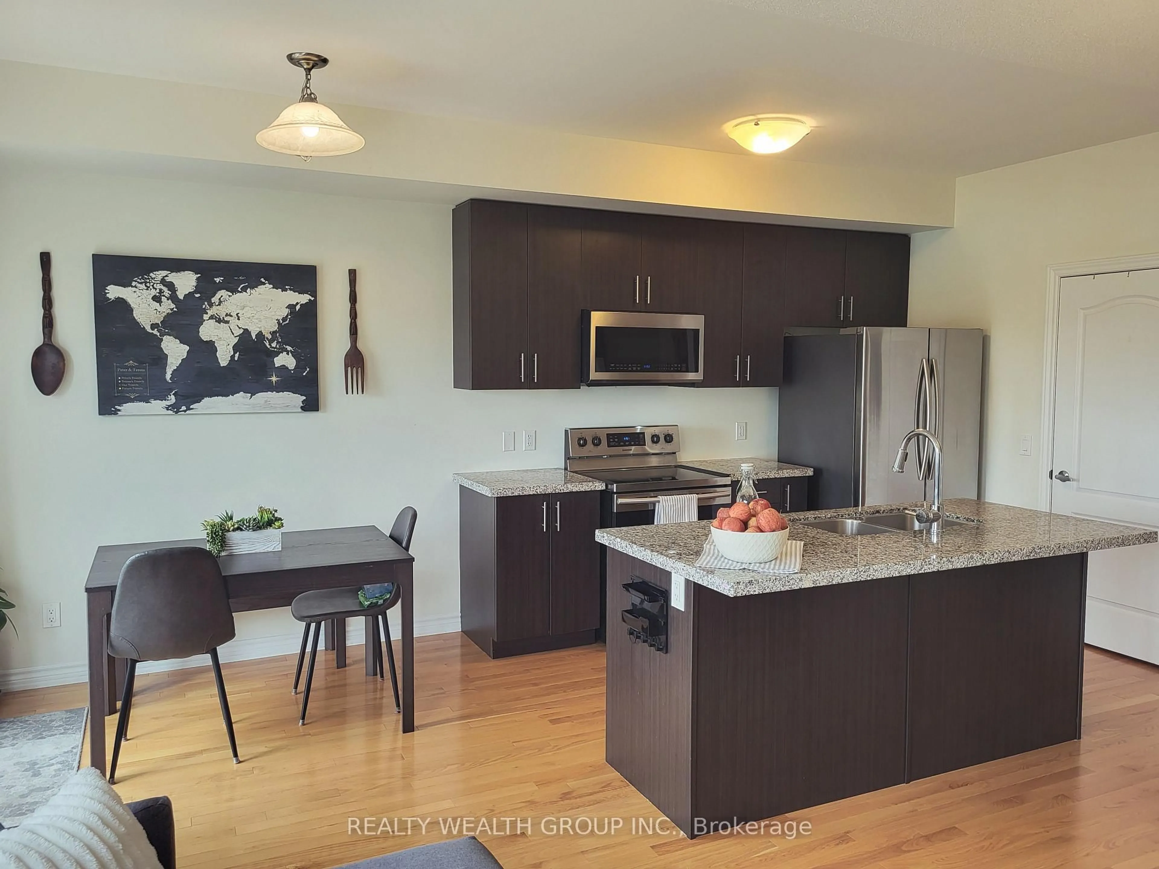 Open concept kitchen, wood/laminate floor for 3060 Cascade Common, Oakville Ontario L6H 0R8