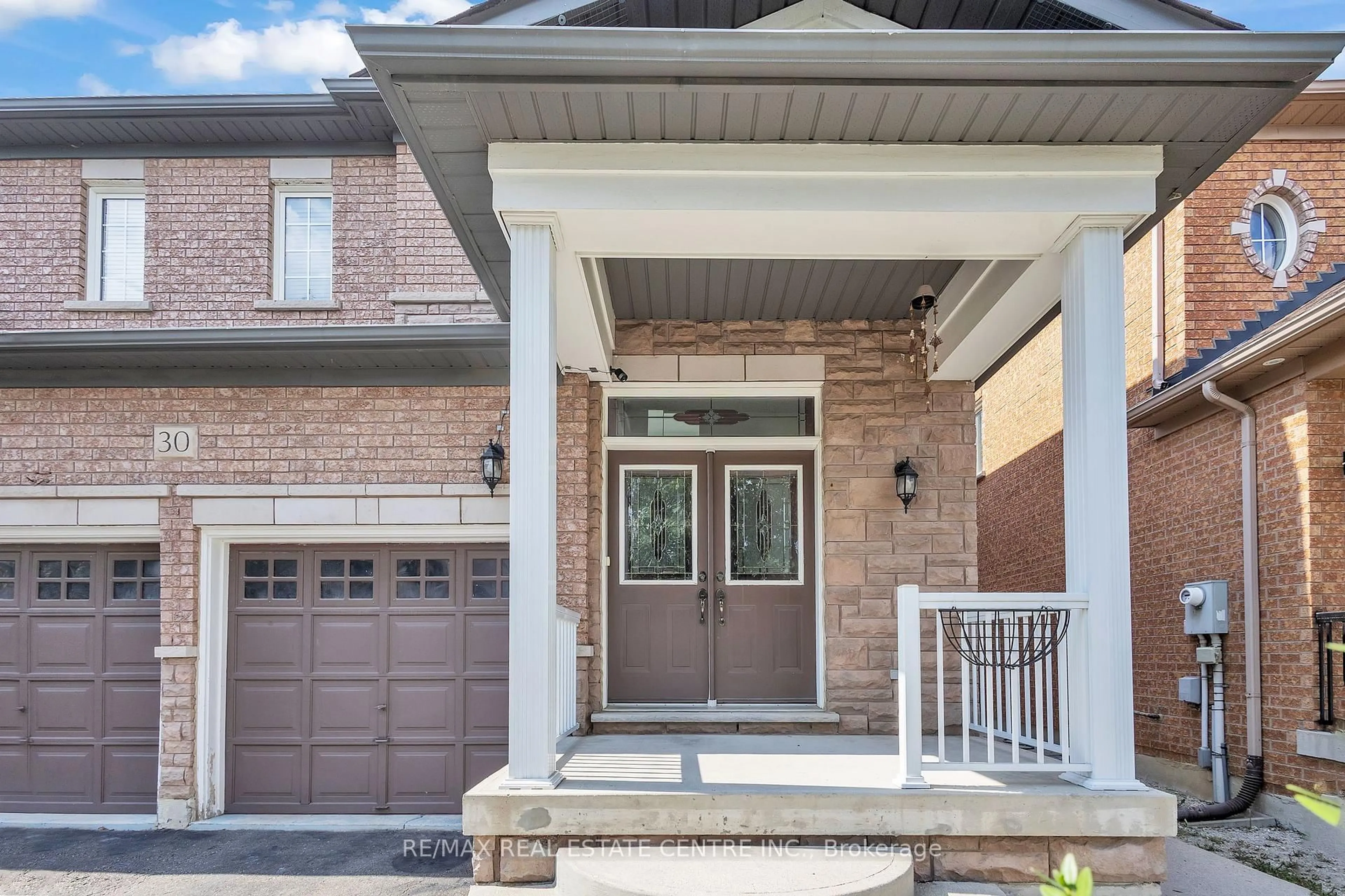 Home with brick exterior material, street for 30 El Camino Way, Brampton Ontario L7A 3C4