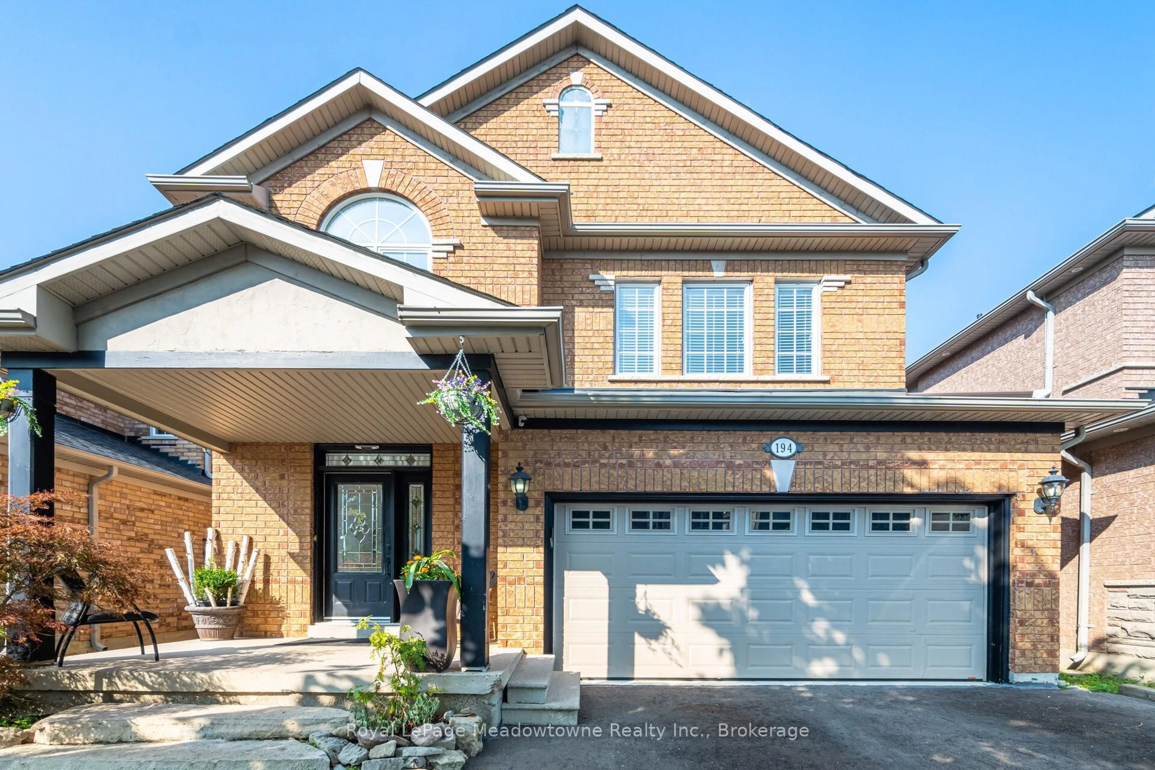 Home with brick exterior material, street for 194 Manley Lane, Milton Ontario L9T 5N8