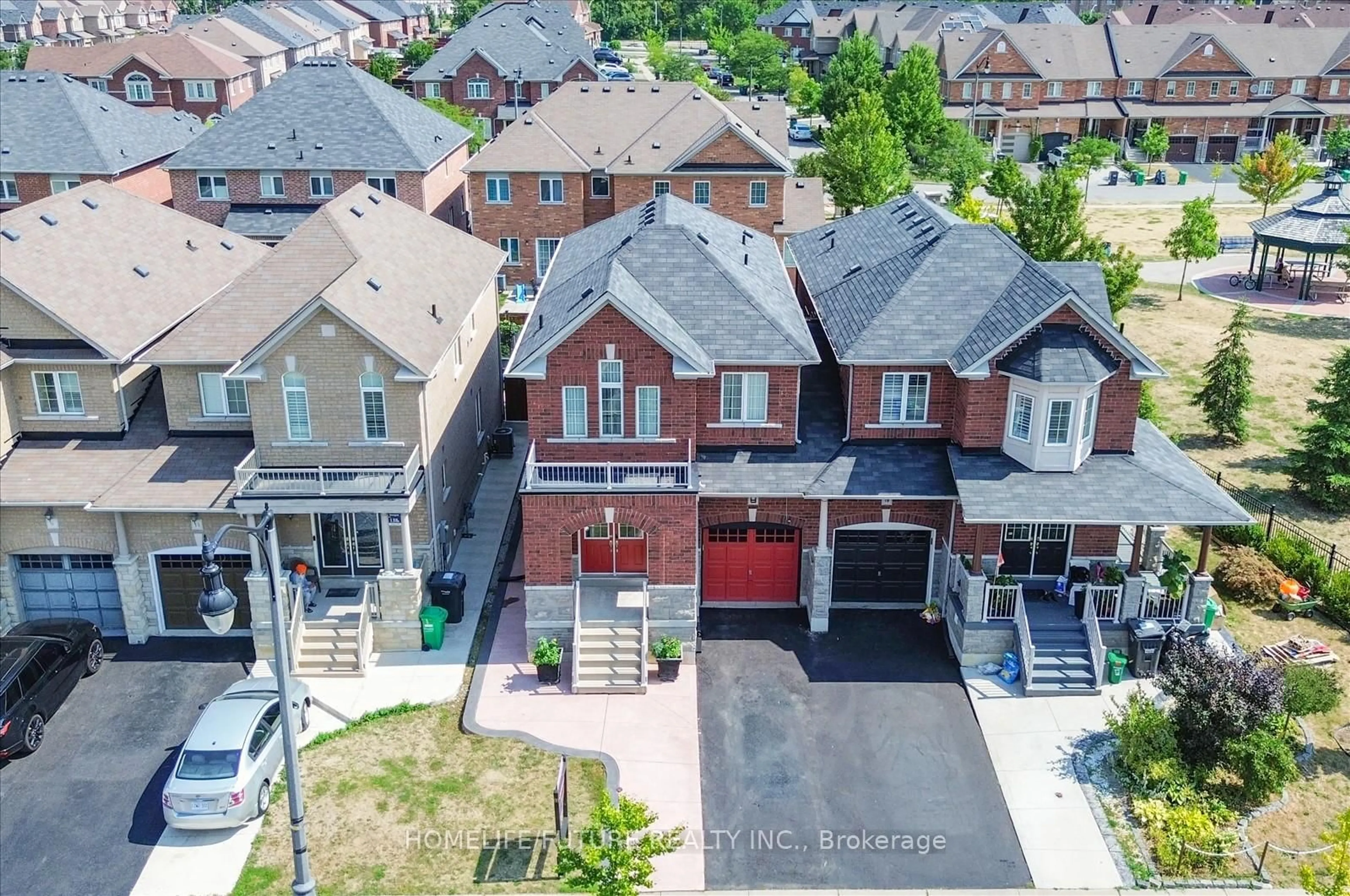 A pic from outside/outdoor area/front of a property/back of a property/a pic from drone, street for 13 Oklahoma Dr, Brampton Ontario L6P 3L8