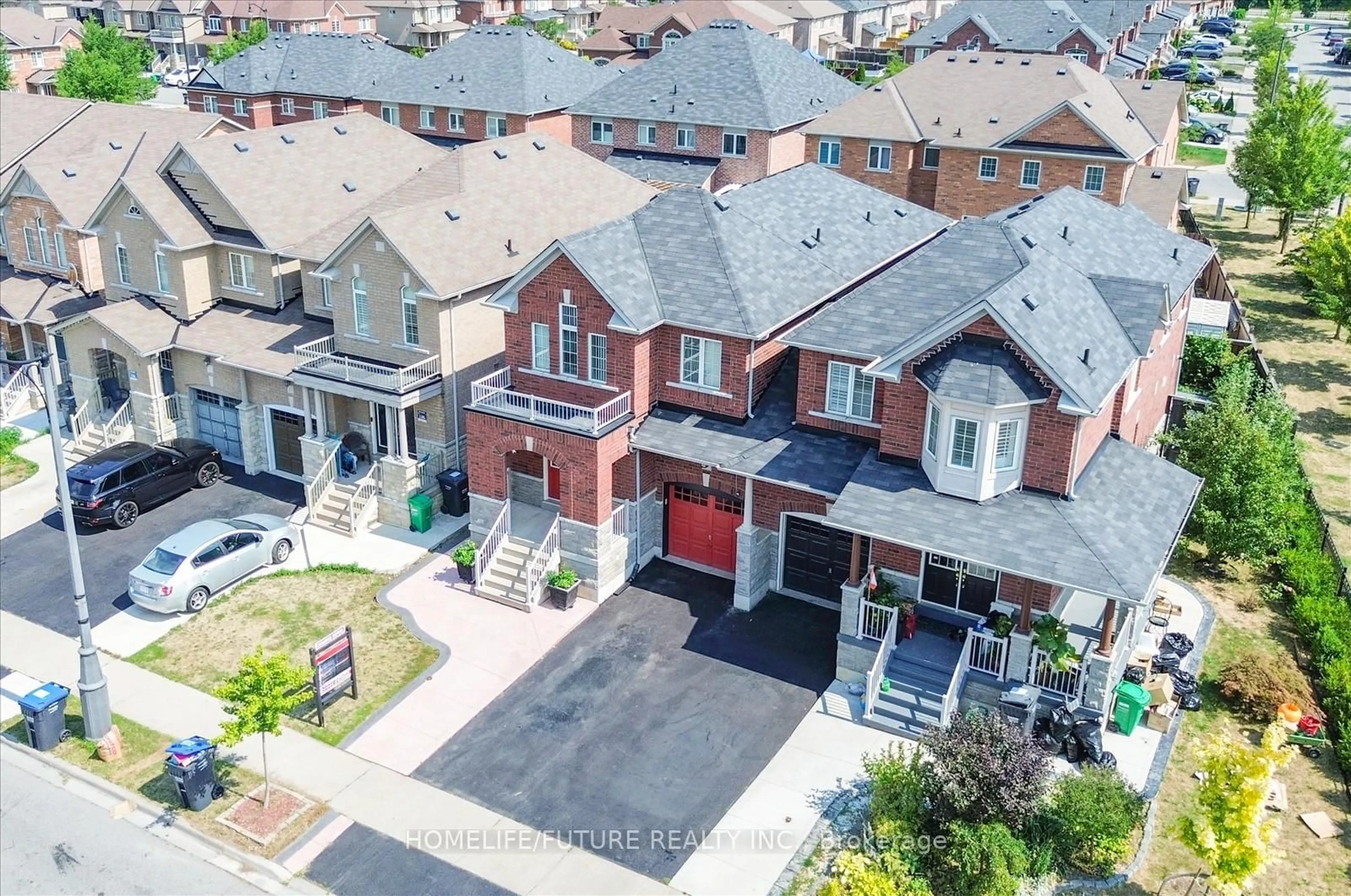 A pic from outside/outdoor area/front of a property/back of a property/a pic from drone, street for 13 Oklahoma Dr, Brampton Ontario L6P 3L8
