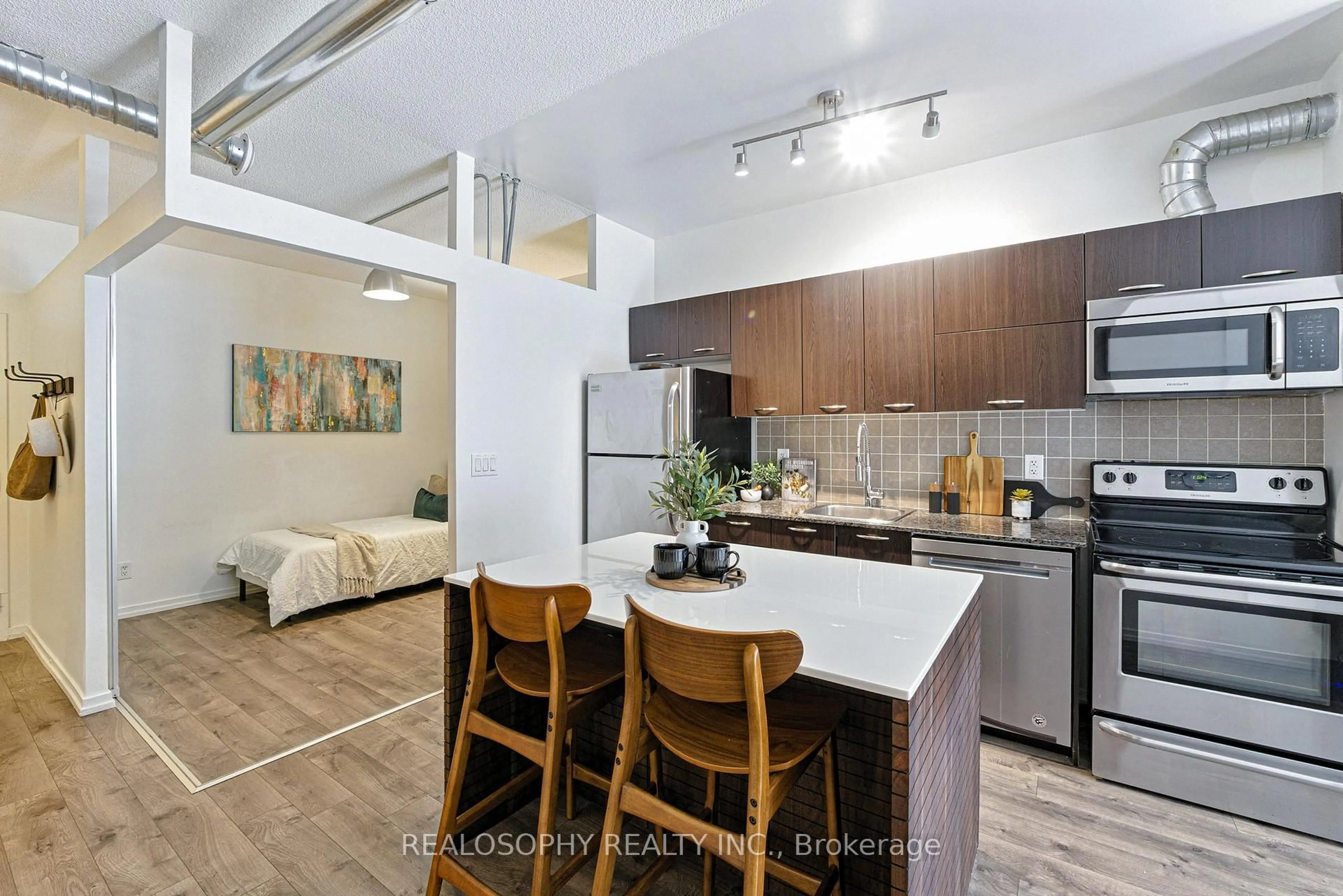 Open concept kitchen, unknown for 38 Joe Shuster Way #304, Toronto Ontario M6K 0A5
