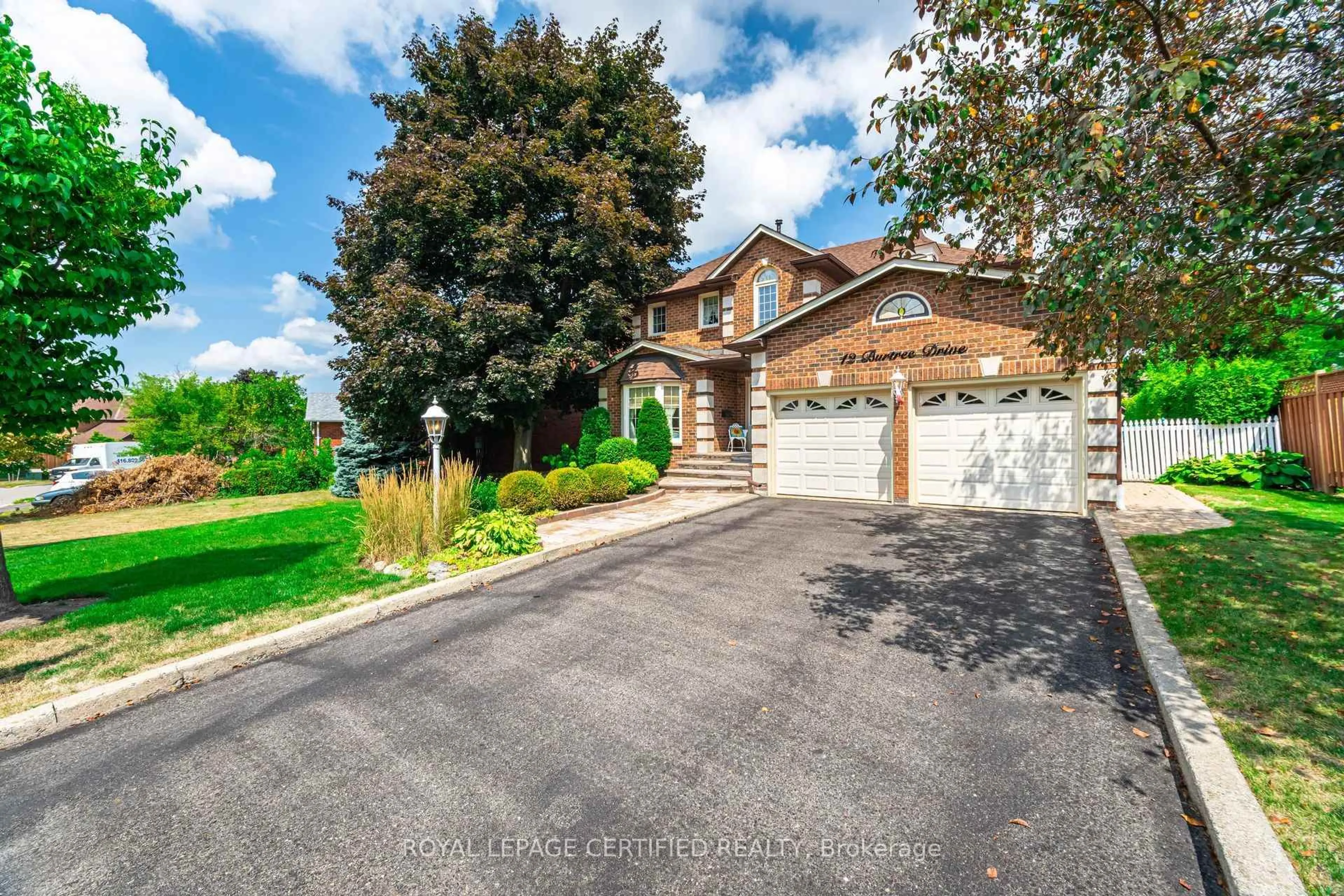 Home with brick exterior material, street for 12 Burtree Dr, Brampton Ontario L6Z 3K6