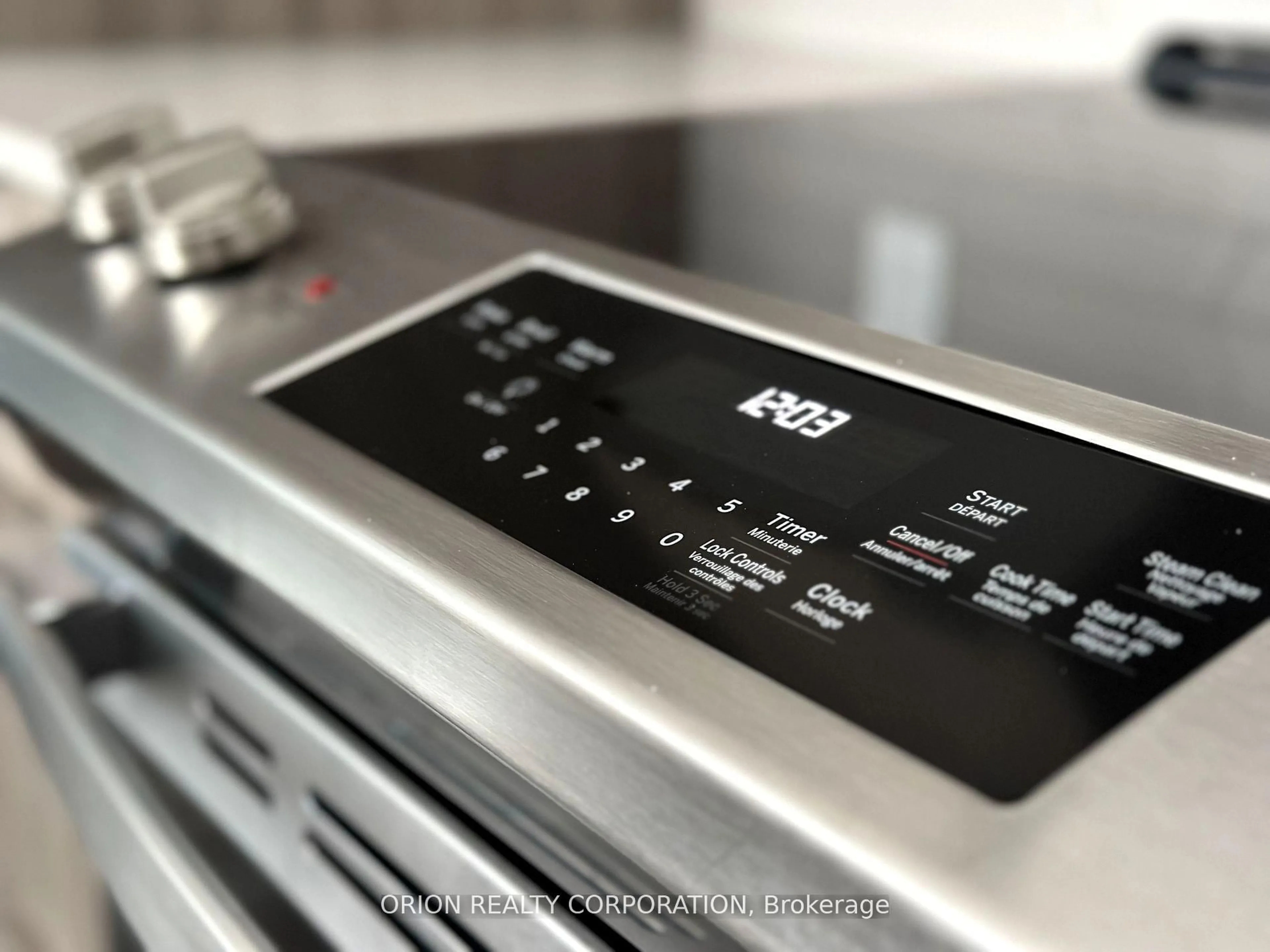 Kitchen with laundary machines, floor is not visible for 430 Square One Dr #510, Mississauga Ontario L5B 0L6