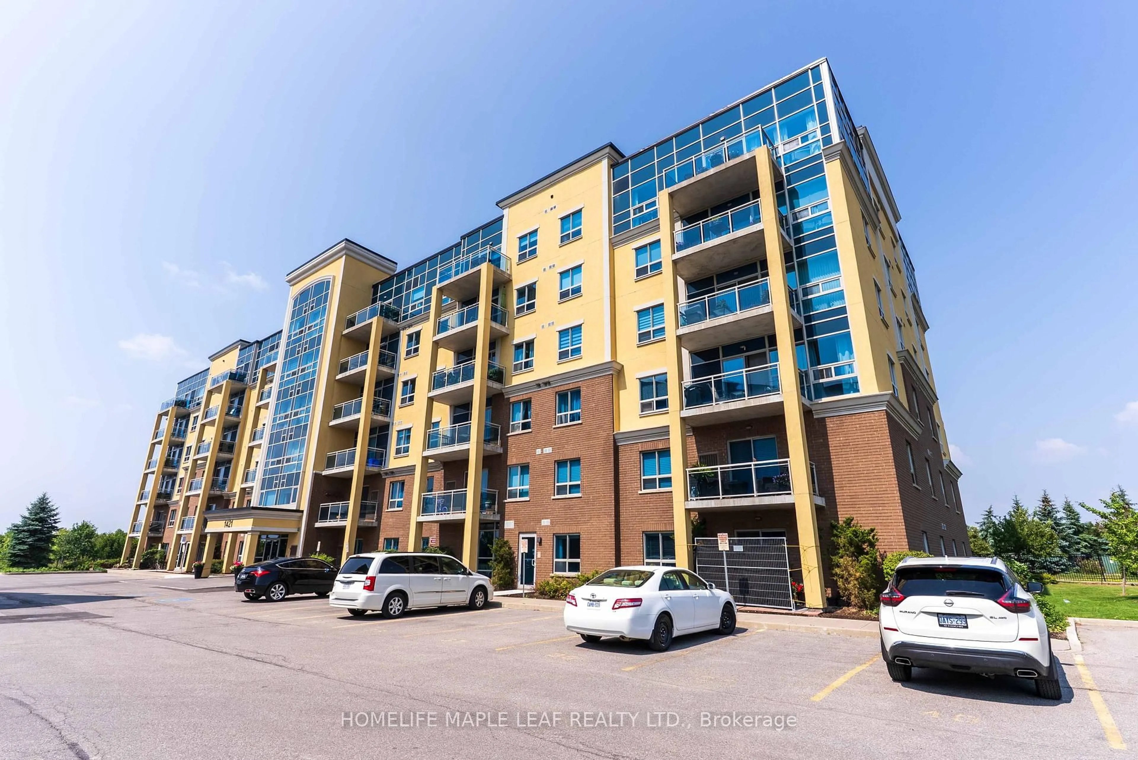 A pic from outside/outdoor area/front of a property/back of a property/a pic from drone, building for 1421 Costigan Rd #307, Milton Ontario L9T 2N4