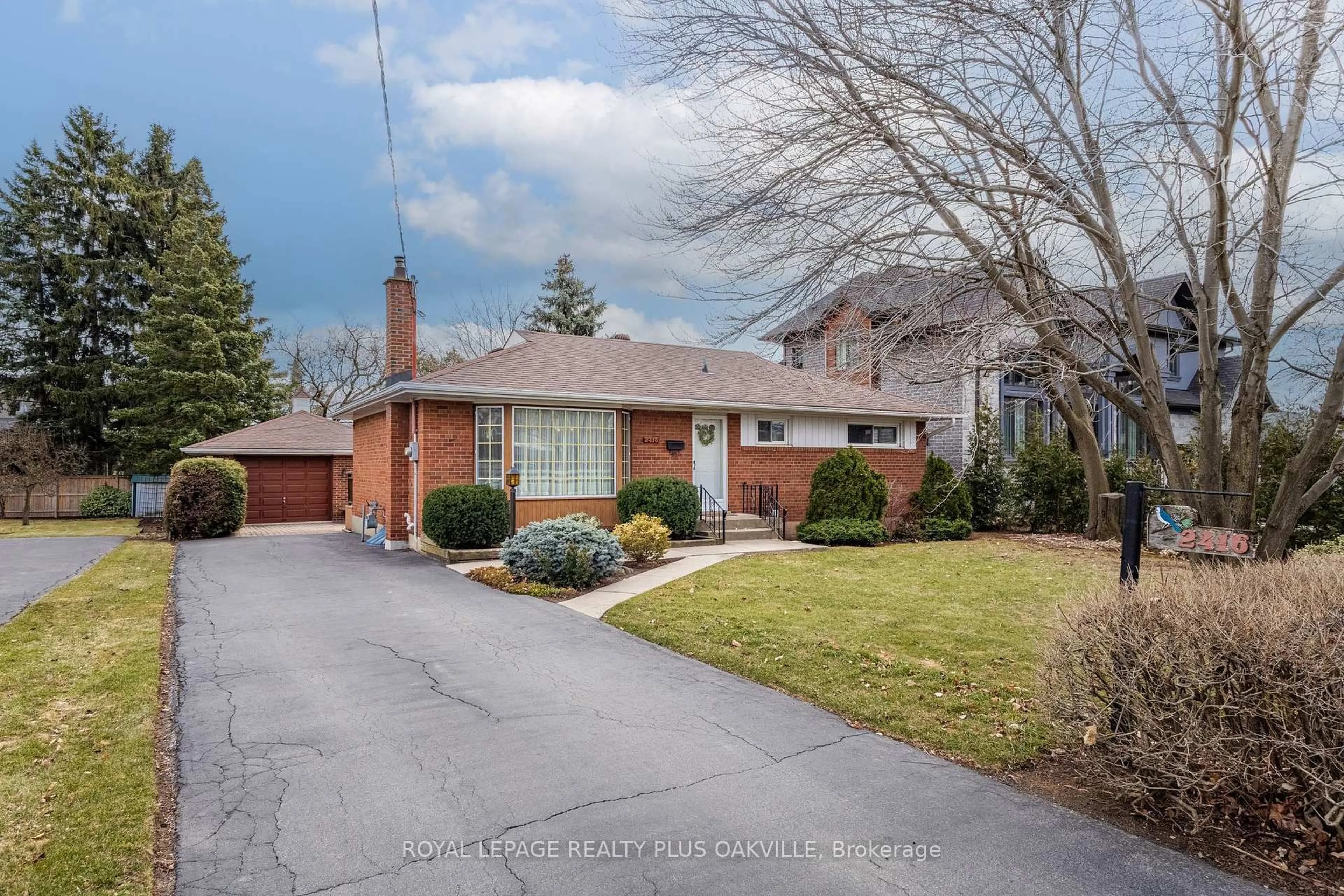 Home with brick exterior material, street for 2416 Rebecca St, Oakville Ontario L6L 2B2