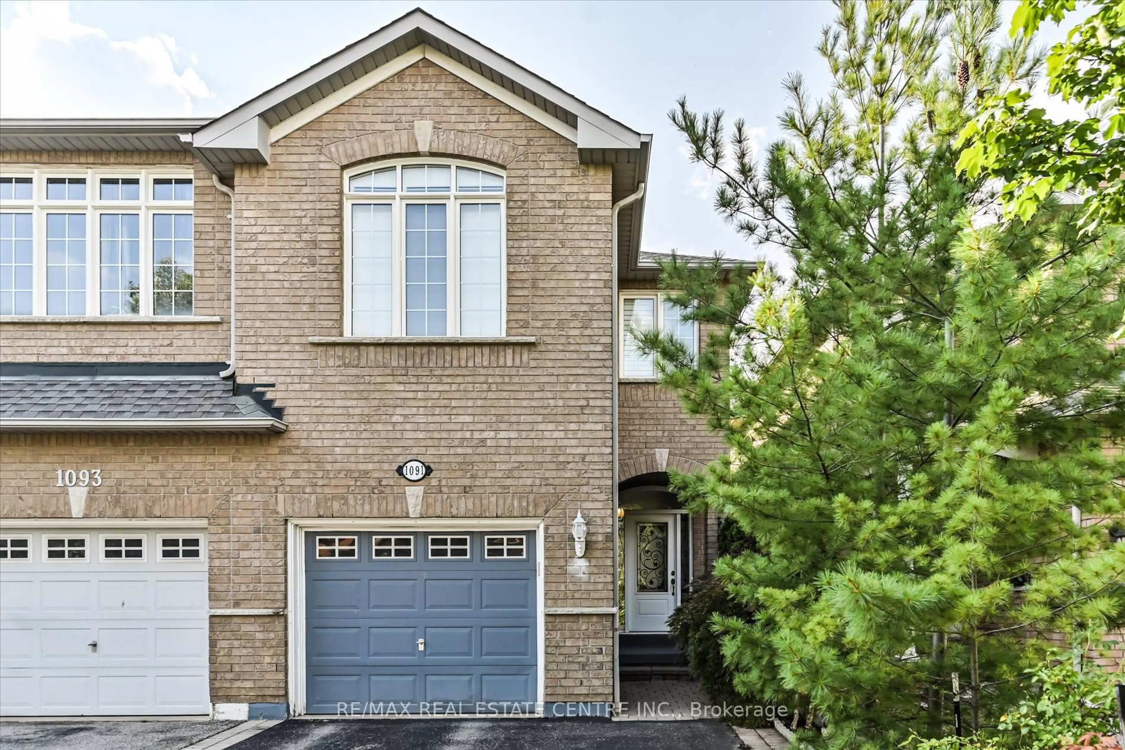 Home with brick exterior material, street for 1091 Windbrook Grve, Mississauga Ontario L5V 2T2
