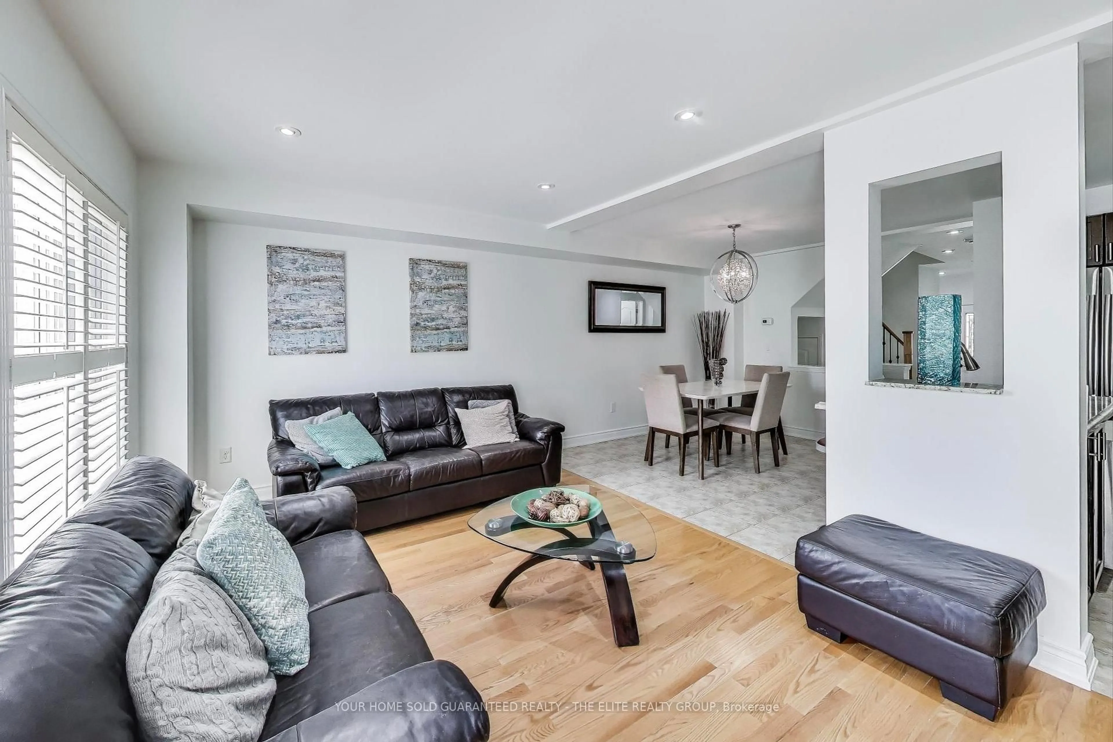 Living room with furniture, wood/laminate floor for 7 Lotus St, Brampton Ontario L6P 3E1