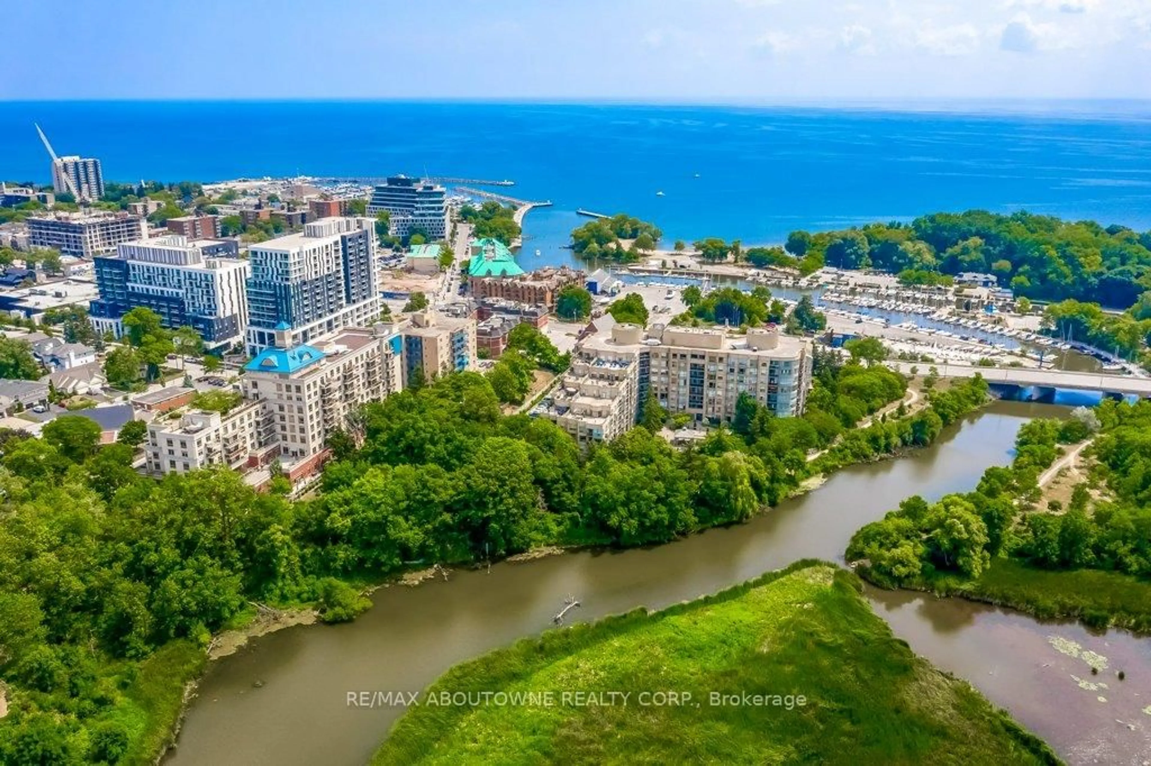 A pic from outside/outdoor area/front of a property/back of a property/a pic from drone, water/lake/river/ocean view for 2511 Lakeshore Rd #720, Oakville Ontario L6L 6L9