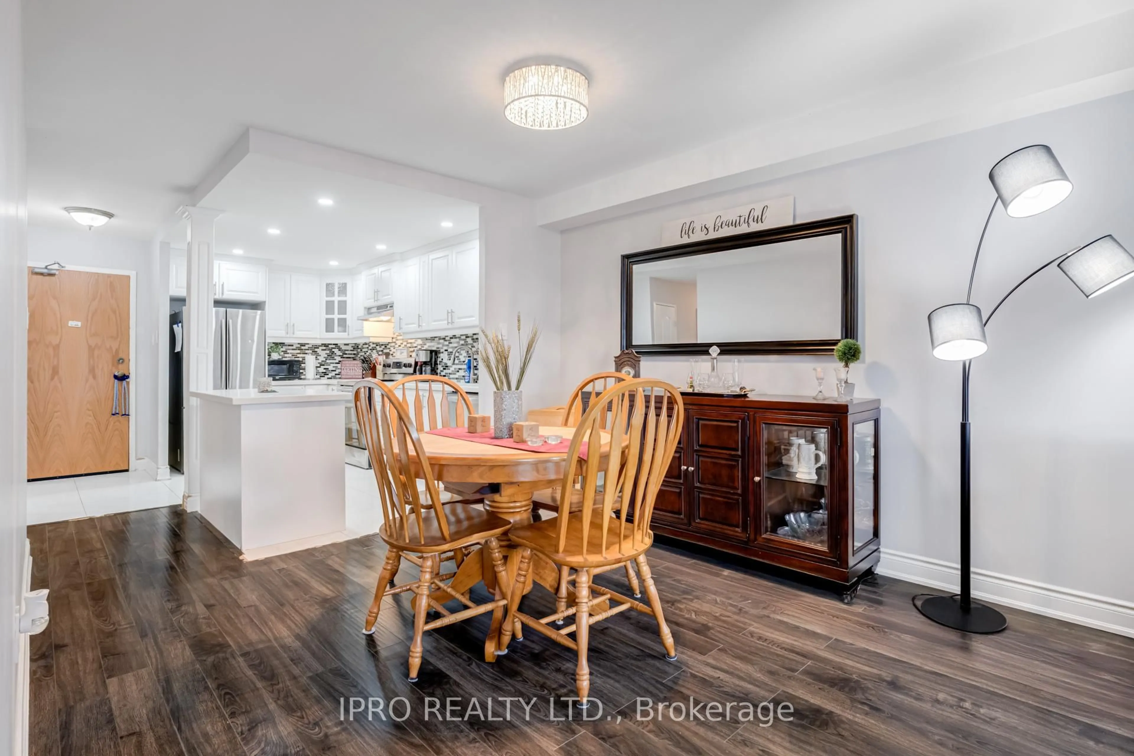 Open concept kitchen, wood/laminate floor for 4 Lisa St #504, Brampton Ontario L6T 4B6