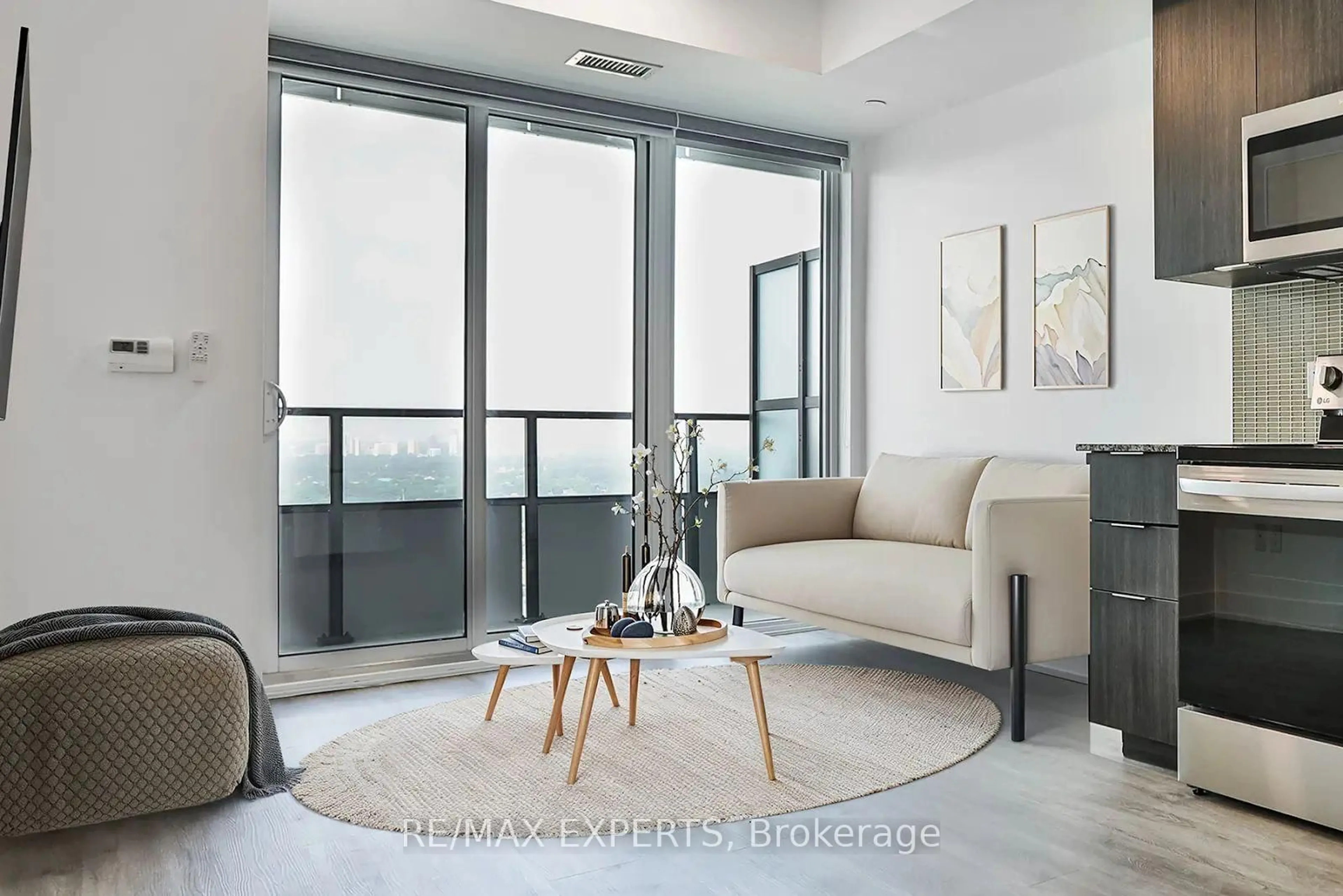Living room with furniture, unknown for 20 Shore Breeze Dr #3703, Toronto Ontario M8V 0C7
