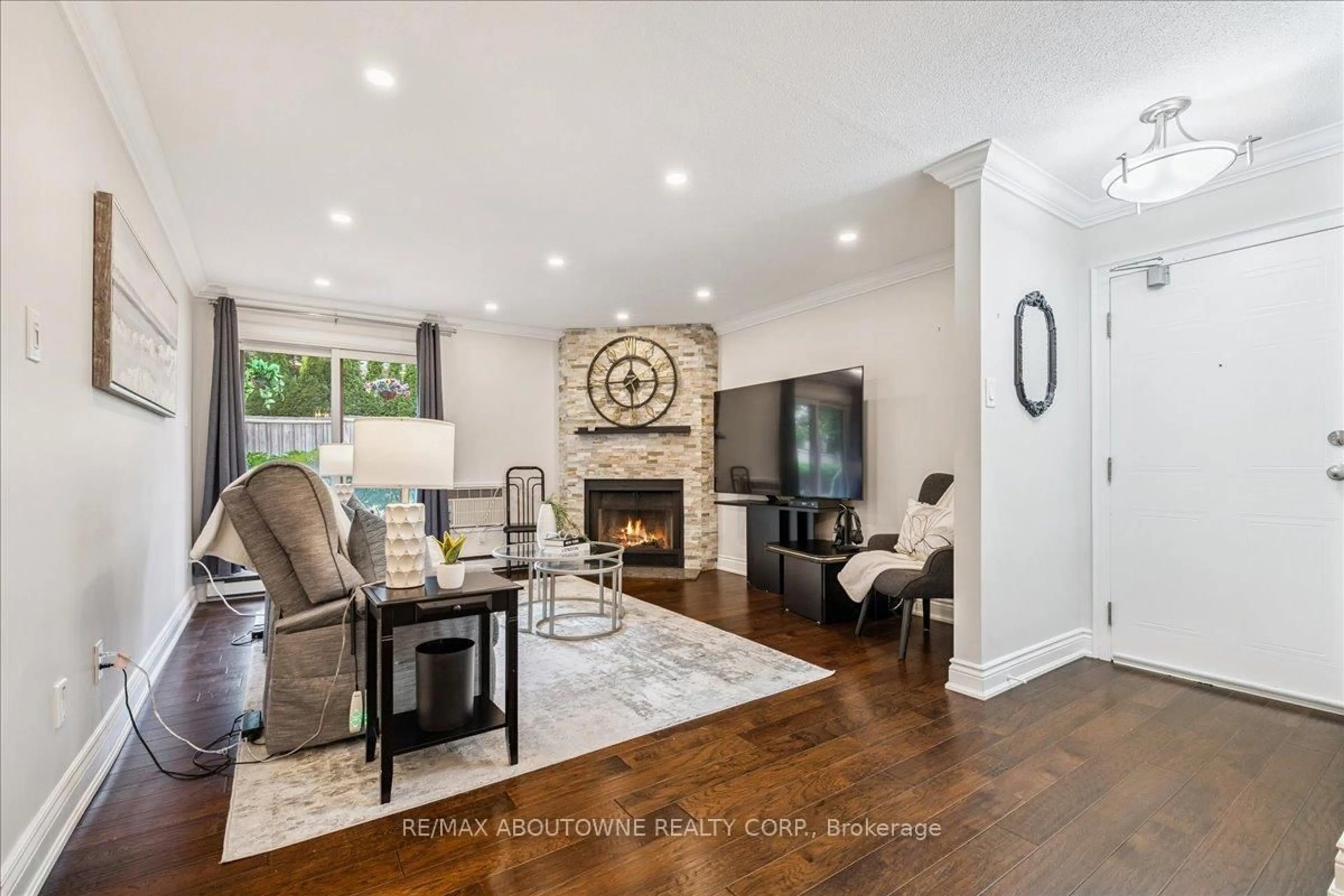 Living room with furniture, unknown for 1500 Pilgrims Way #313, Oakville Ontario L6M 3G9