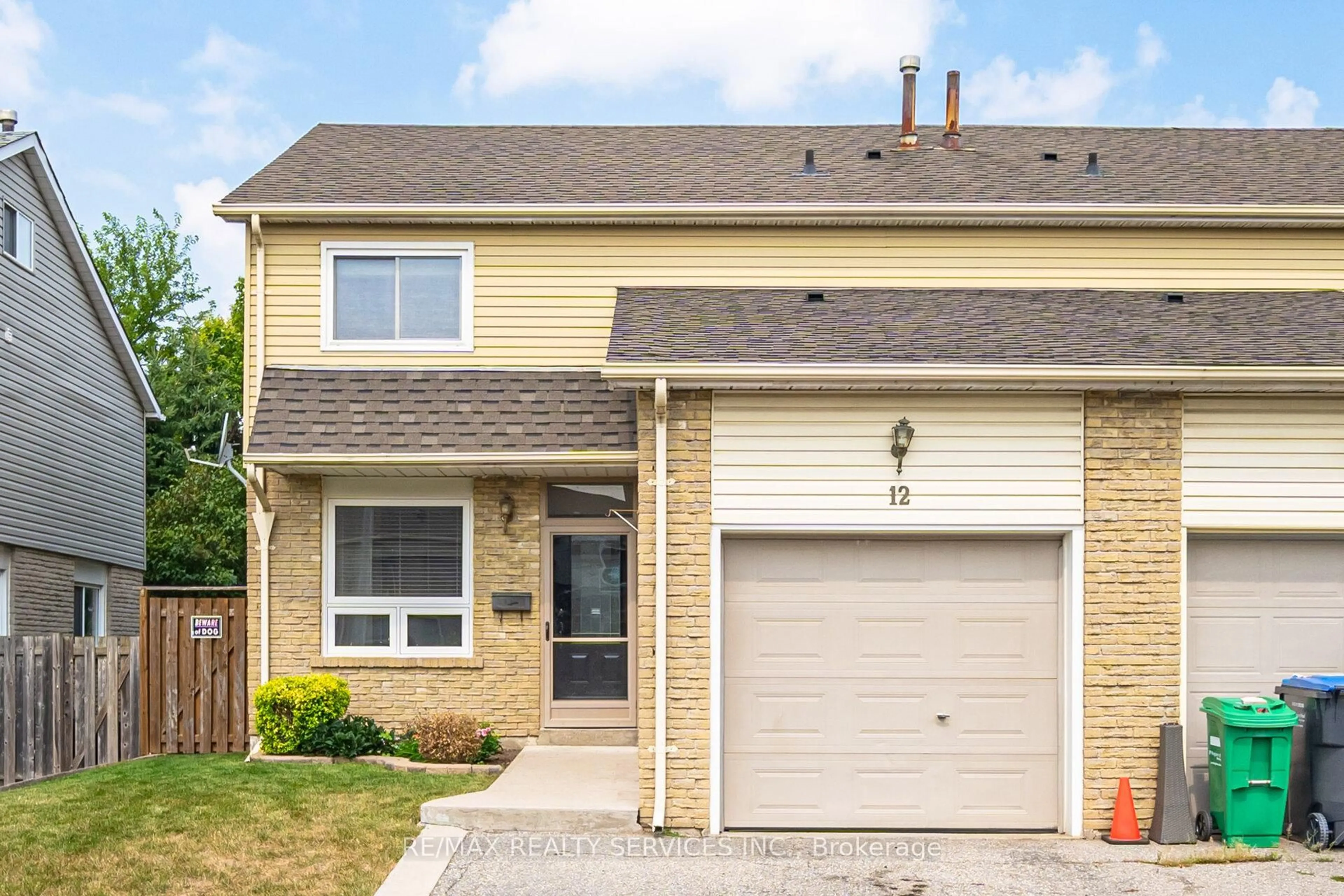 Home with vinyl exterior material, street for 12 Sparklett Cres, Brampton Ontario L6Z 1M8