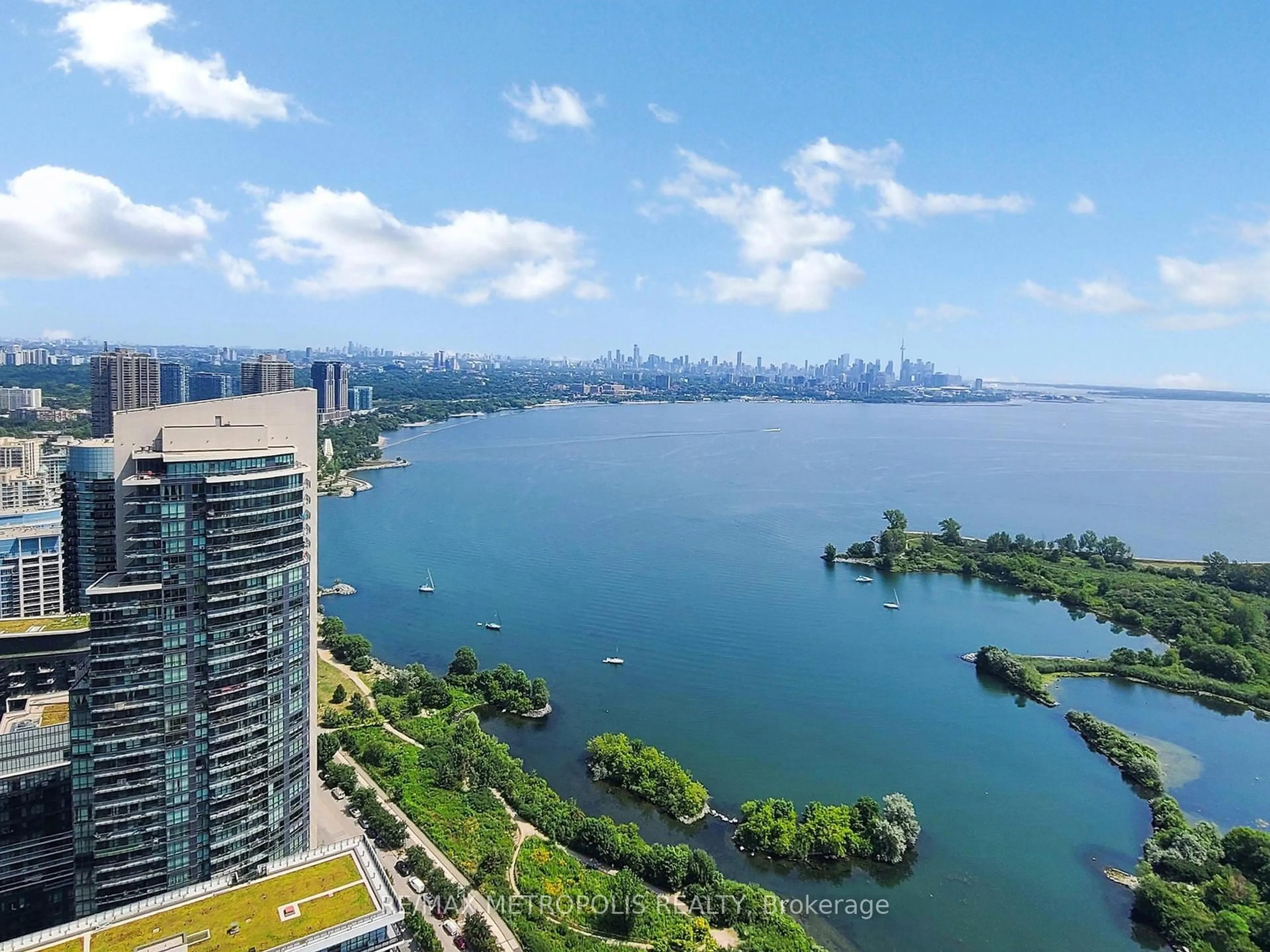 A pic from outside/outdoor area/front of a property/back of a property/a pic from drone, water/lake/river/ocean view for 20 Shore Breeze Dr #4504, Toronto Ontario M8V 0C7