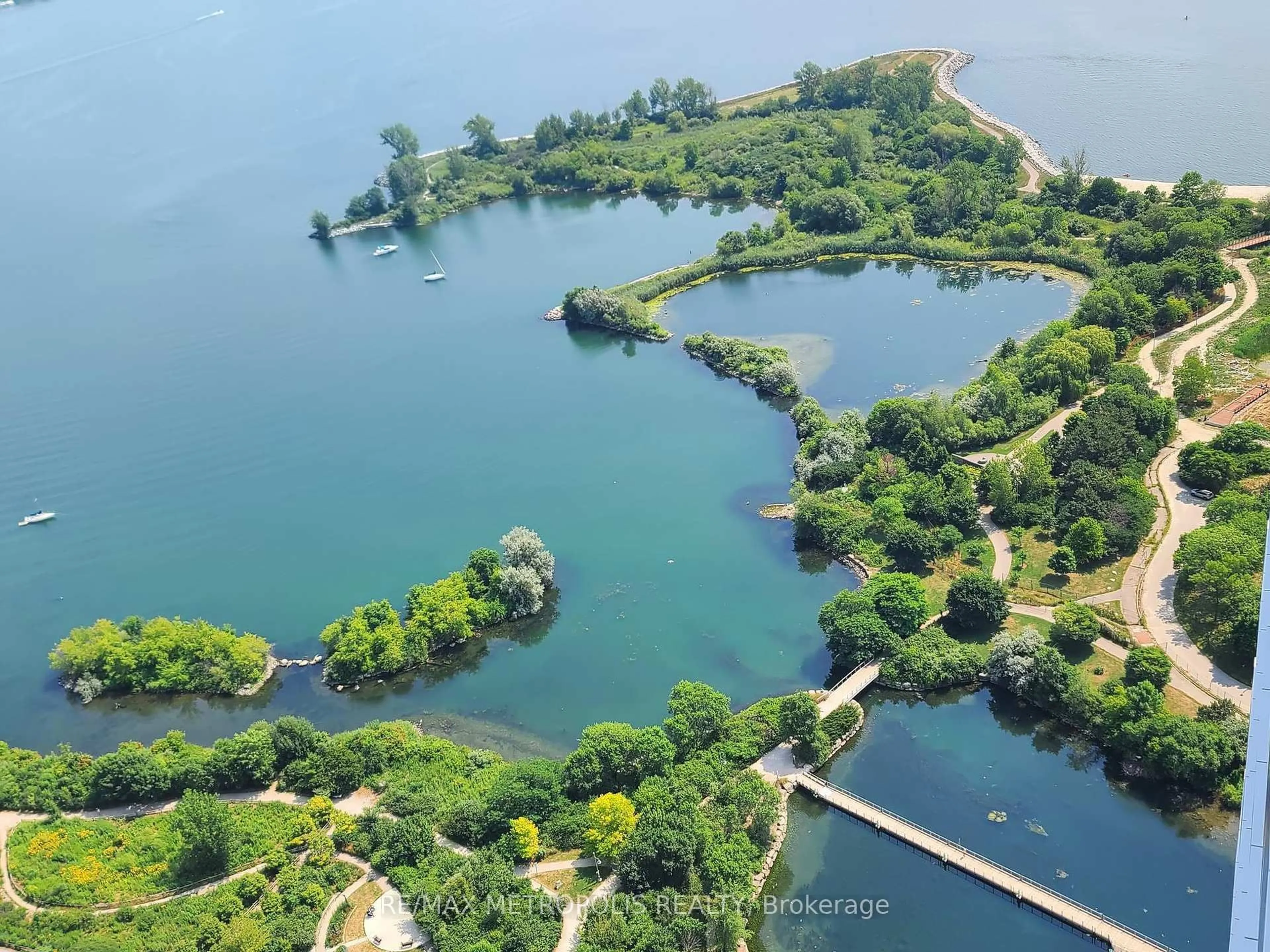 A pic from outside/outdoor area/front of a property/back of a property/a pic from drone, water/lake/river/ocean view for 20 Shore Breeze Dr #4504, Toronto Ontario M8V 0C7
