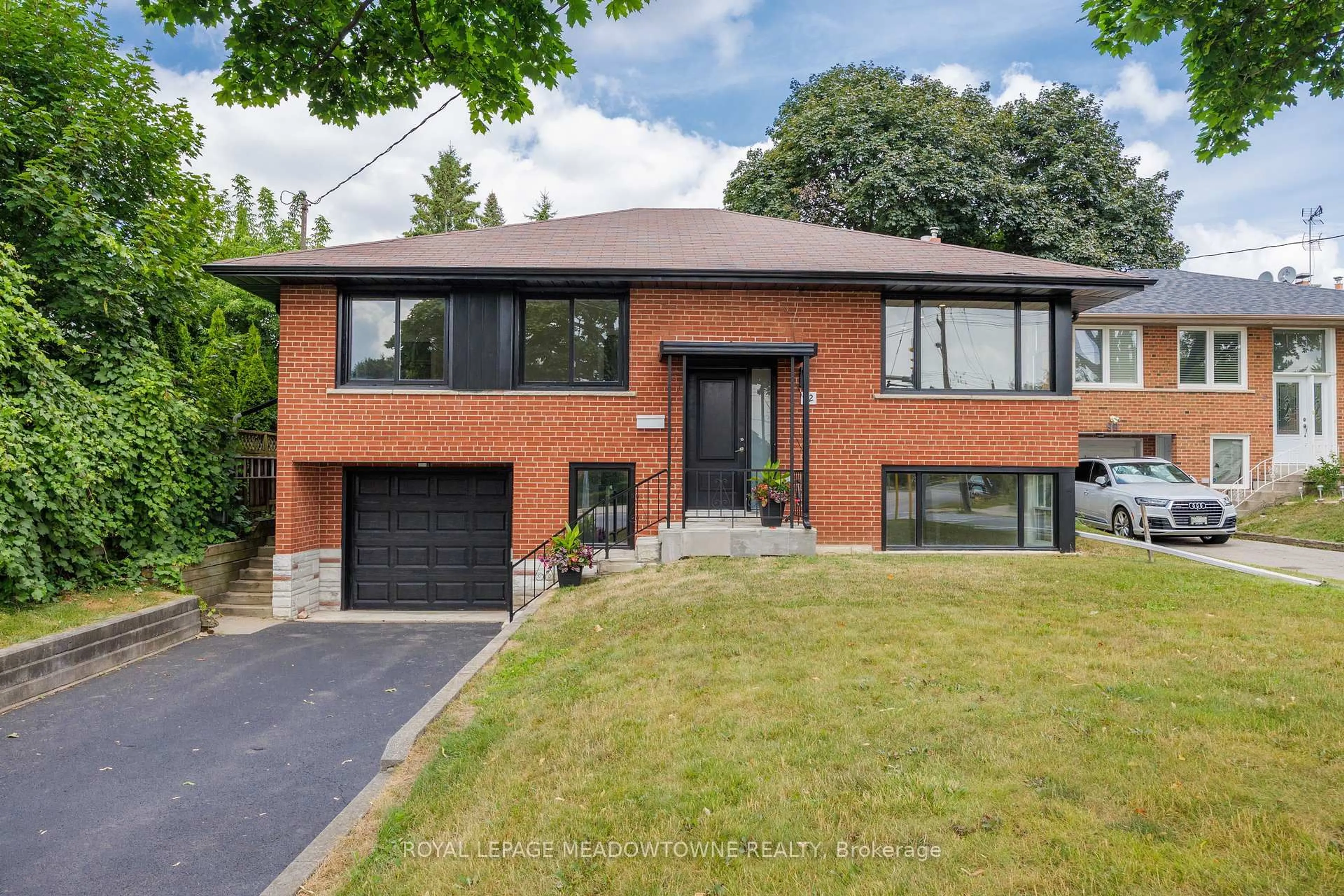 Home with brick exterior material, street for 92 The Westway, Toronto Ontario M9P 2B2