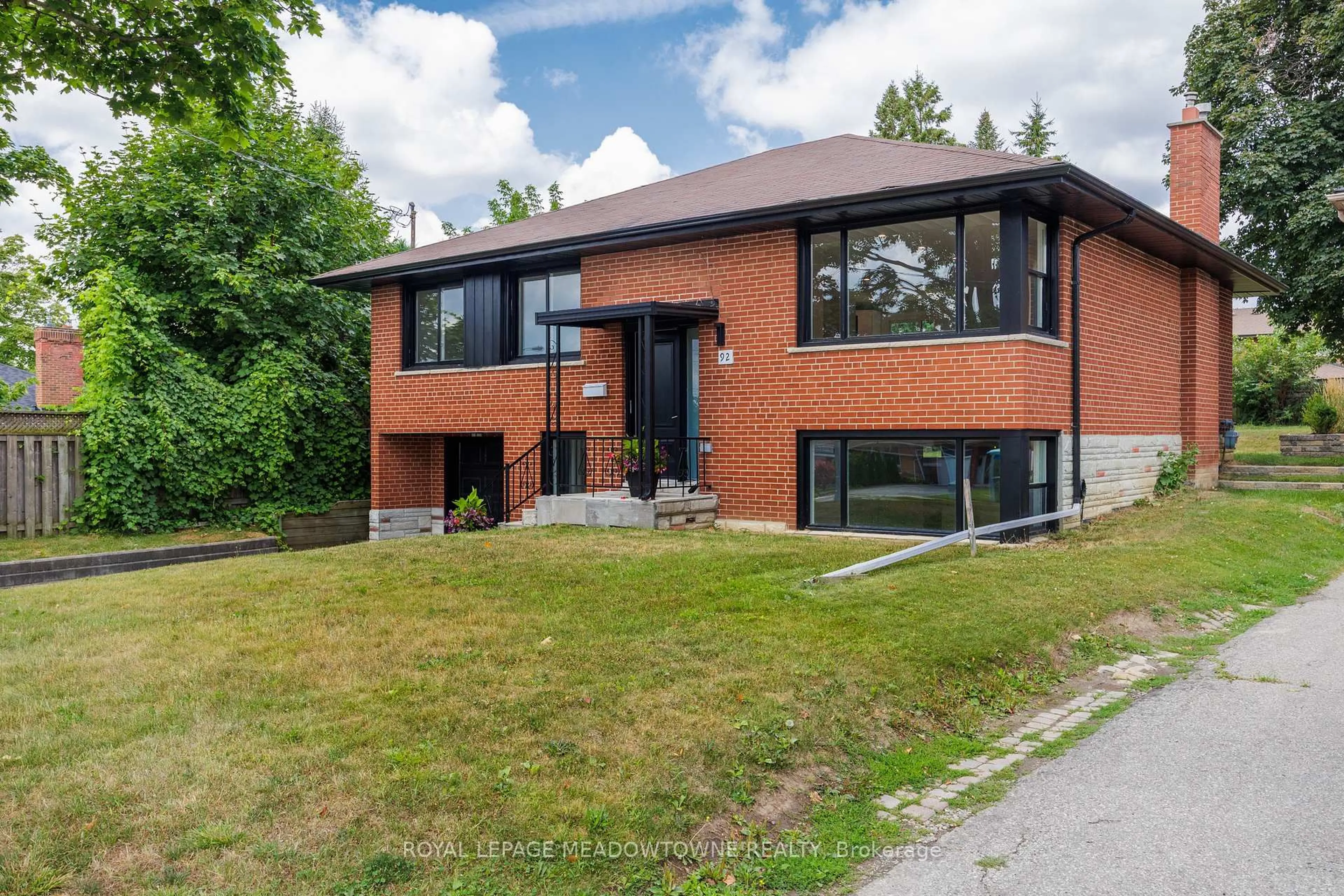 Home with brick exterior material, street for 92 The Westway, Toronto Ontario M9P 2B2