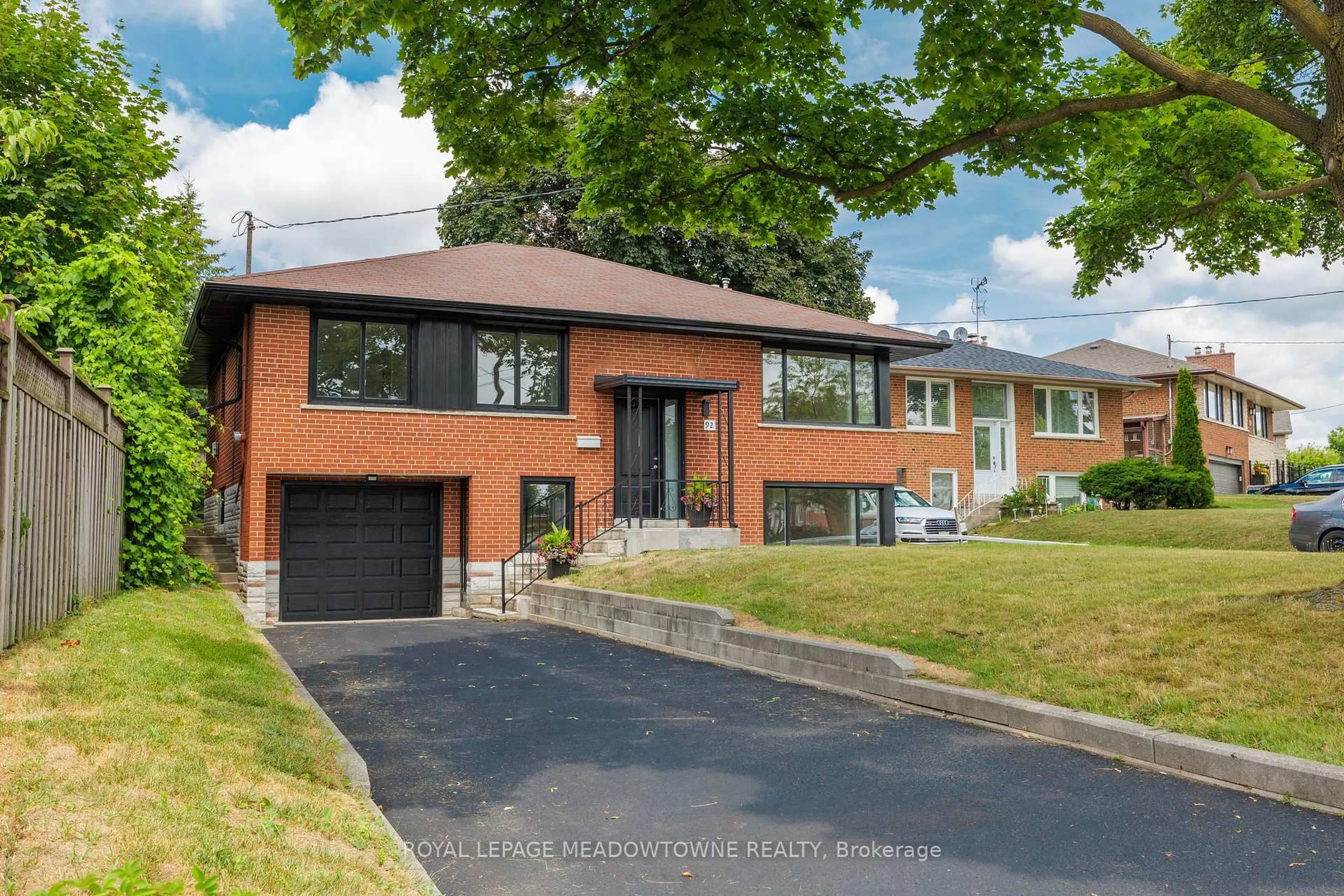 Home with brick exterior material, street for 92 The Westway, Toronto Ontario M9P 2B2
