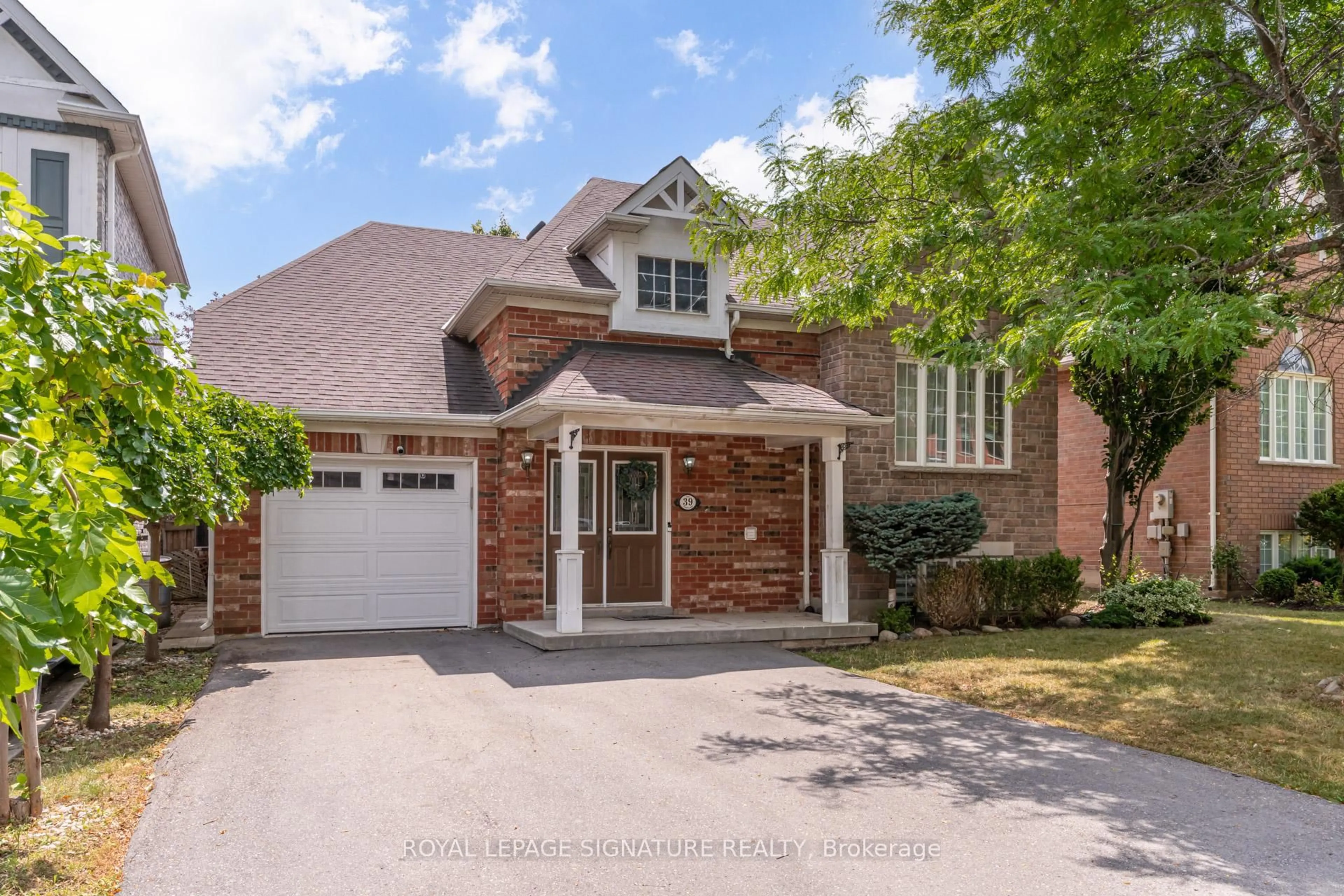Home with brick exterior material, street for 39 Treeline Blvd, Brampton Ontario L6P 1C5