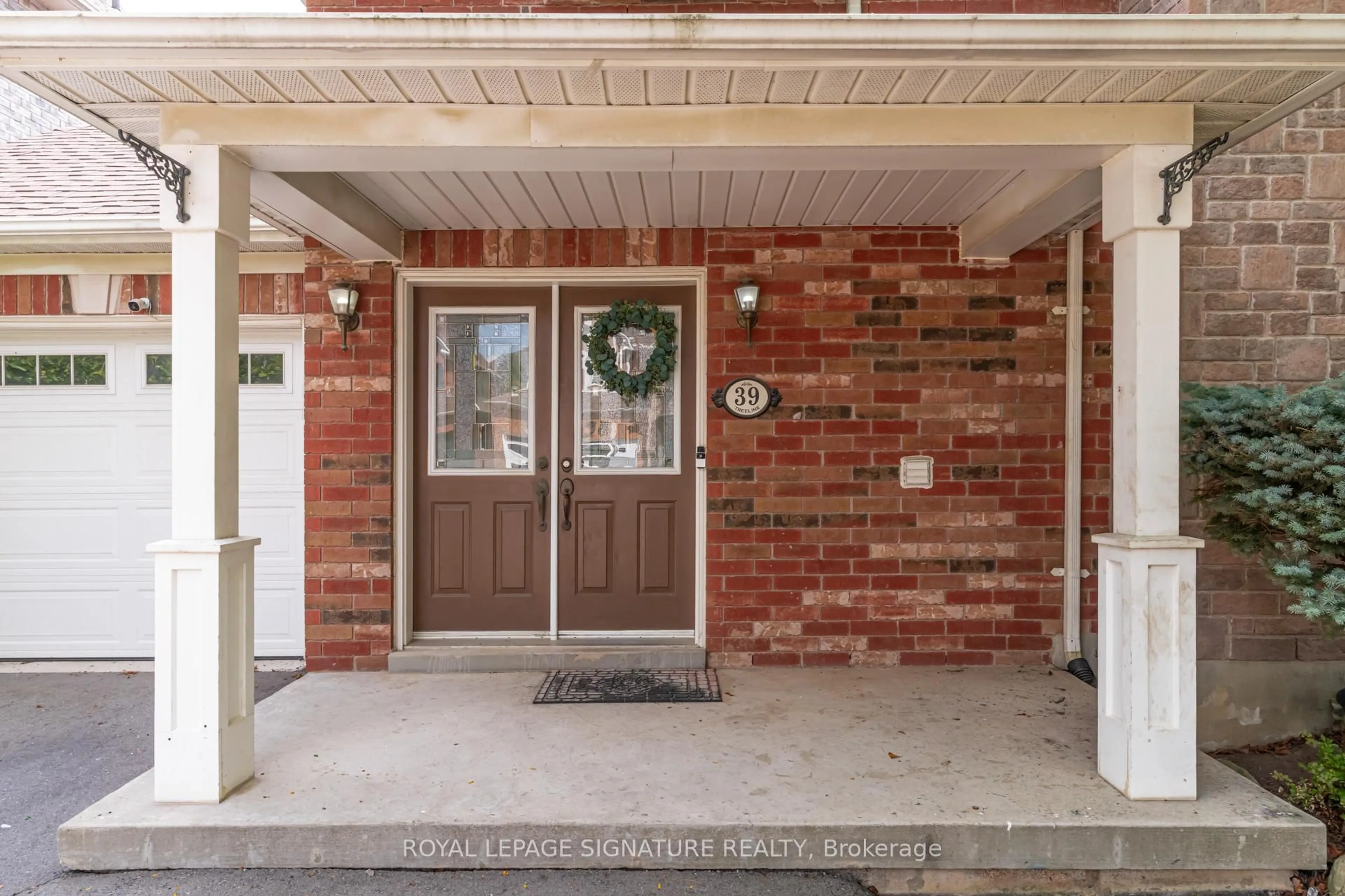 Home with brick exterior material, street for 39 Treeline Blvd, Brampton Ontario L6P 1C5