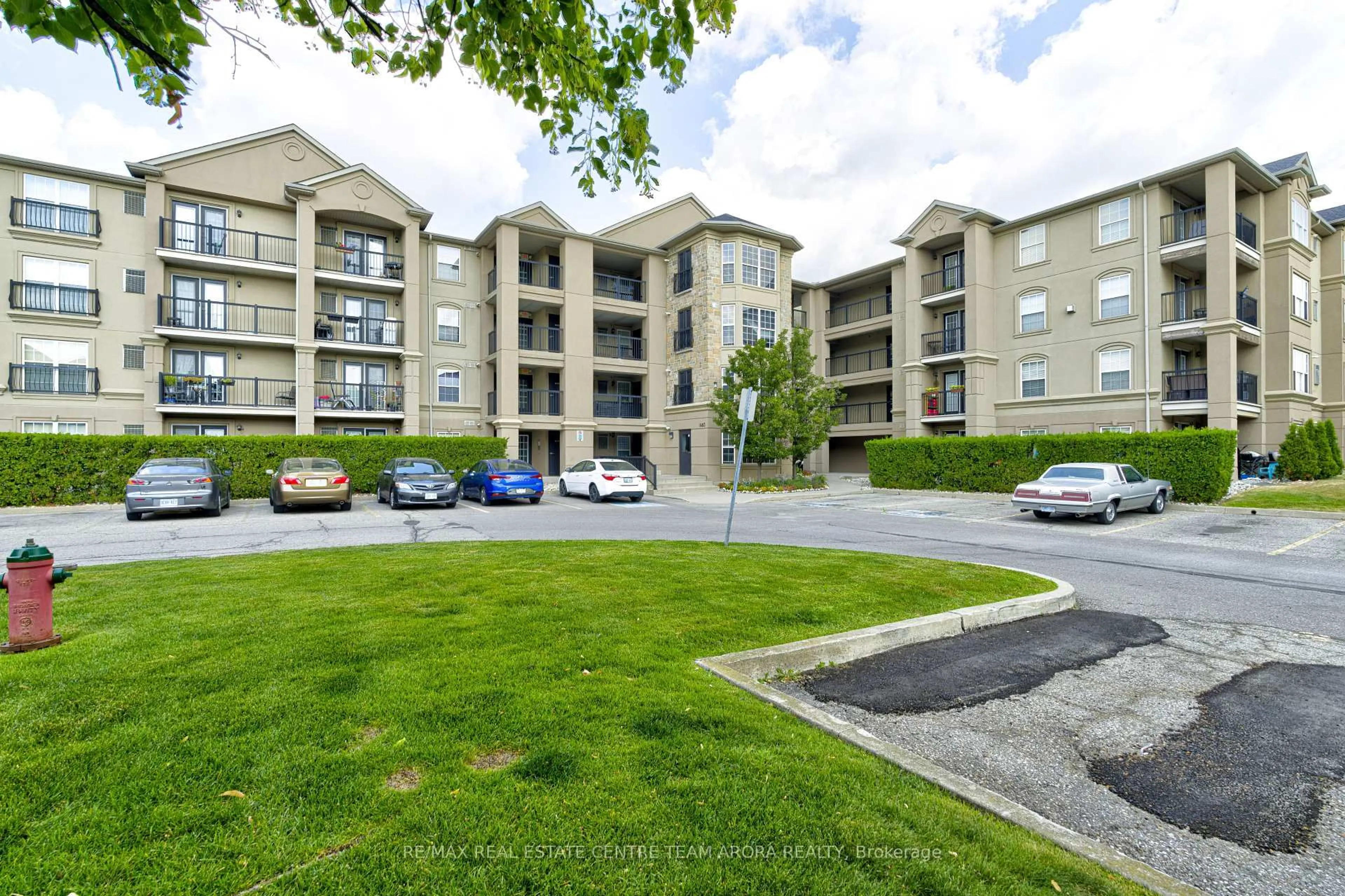 A pic from outside/outdoor area/front of a property/back of a property/a pic from drone, unknown for 1483 Maple Ave #408, Milton Ontario L9T 0B6
