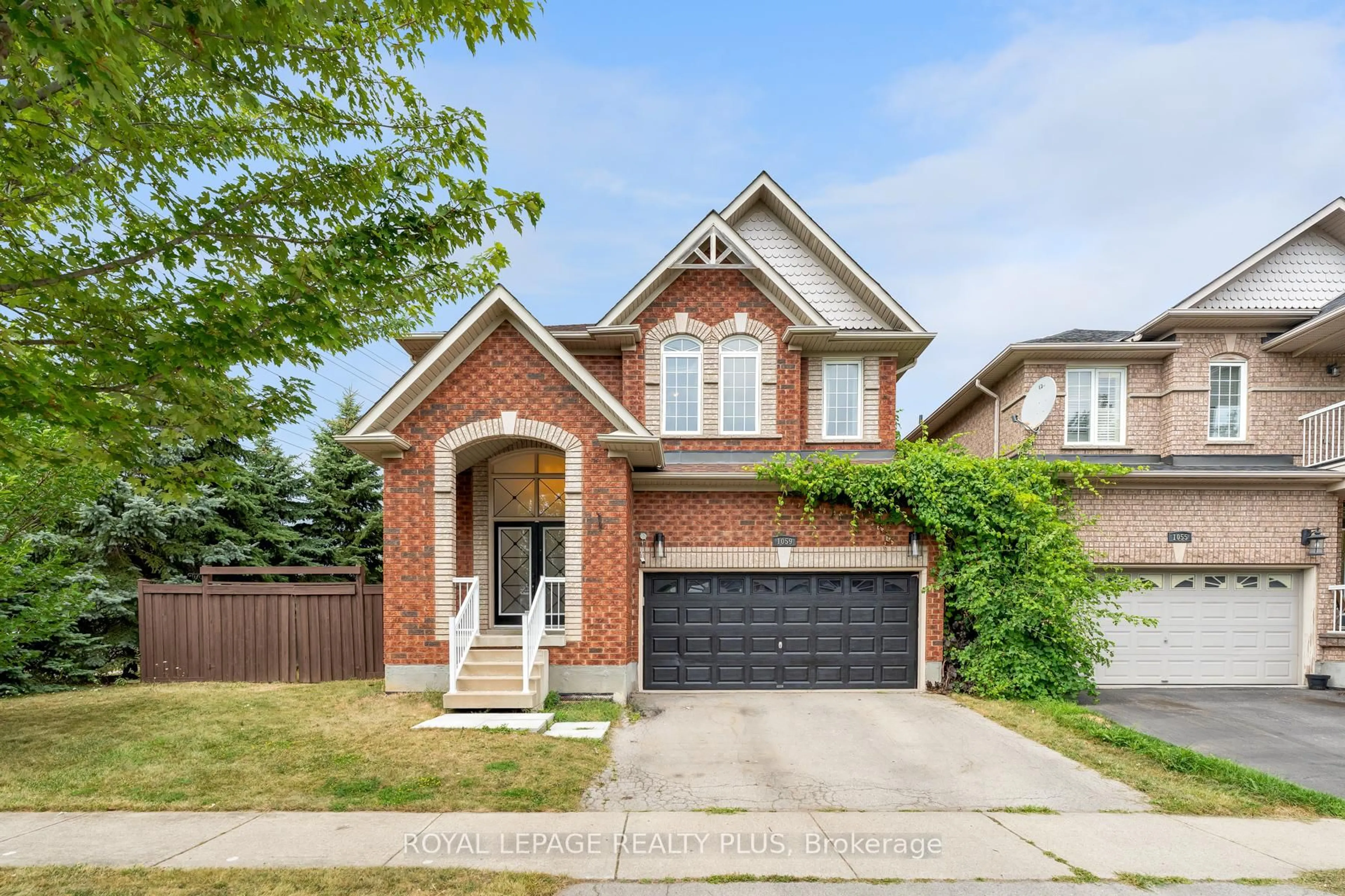 Home with brick exterior material, street for 1059 McClenahan Cres, Milton Ontario L9T 6W6