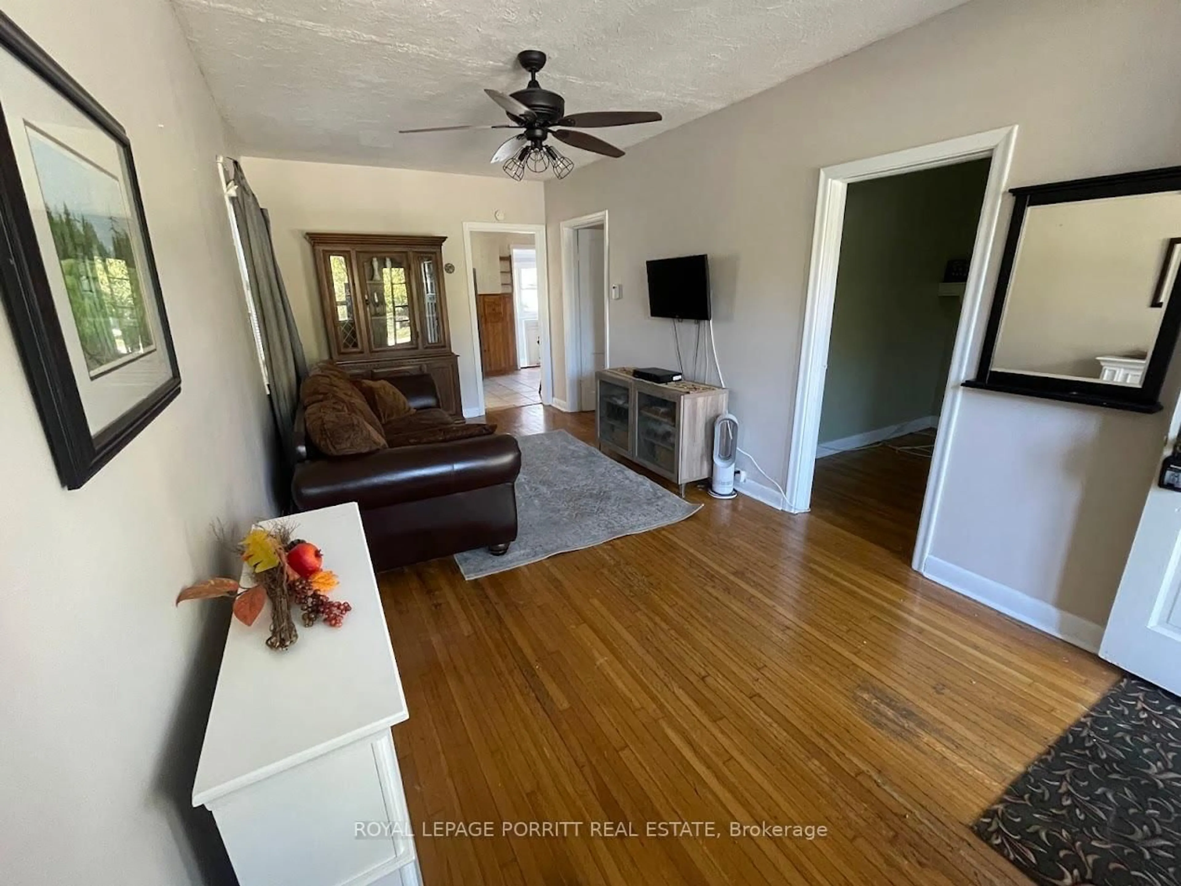 Living room with furniture, wood/laminate floor for 44 Twentieth St, Toronto Ontario M8V 3L6