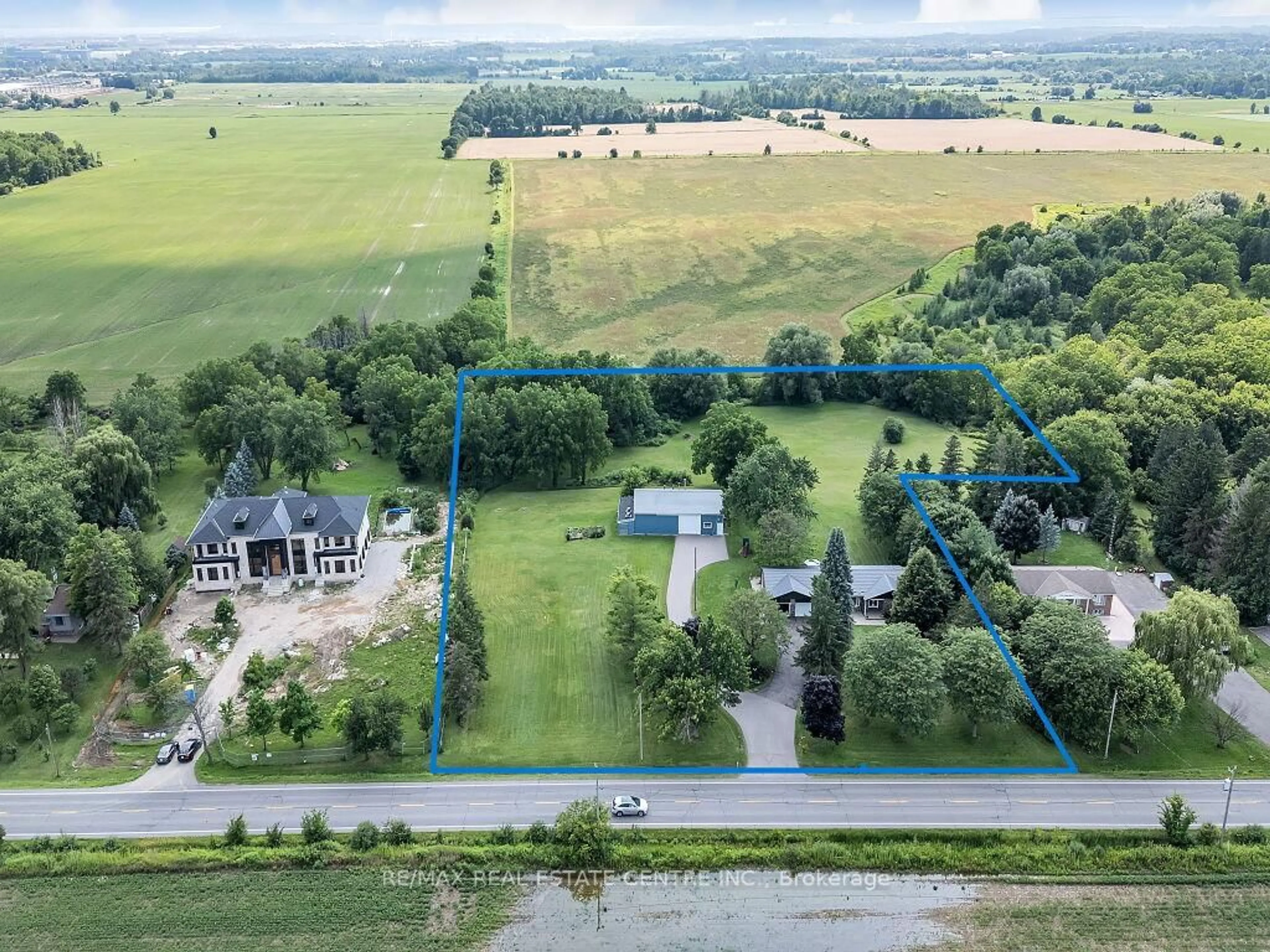 A pic from outside/outdoor area/front of a property/back of a property/a pic from drone, water/lake/river/ocean view for 8438 Ninth Line, Halton Hills Ontario L0P 1K0