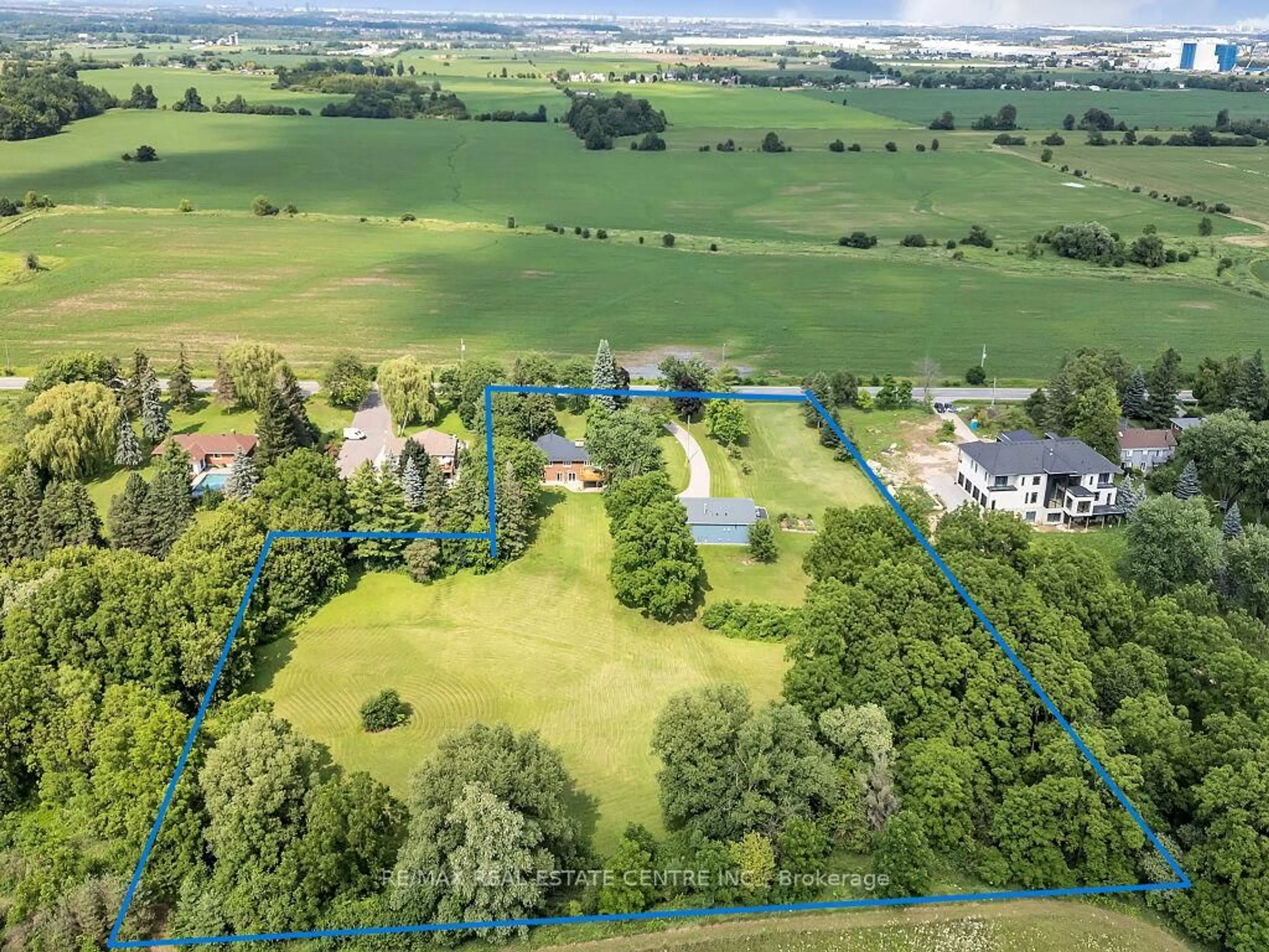 A pic from outside/outdoor area/front of a property/back of a property/a pic from drone, water/lake/river/ocean view for 8438 Ninth Line, Halton Hills Ontario L0P 1K0