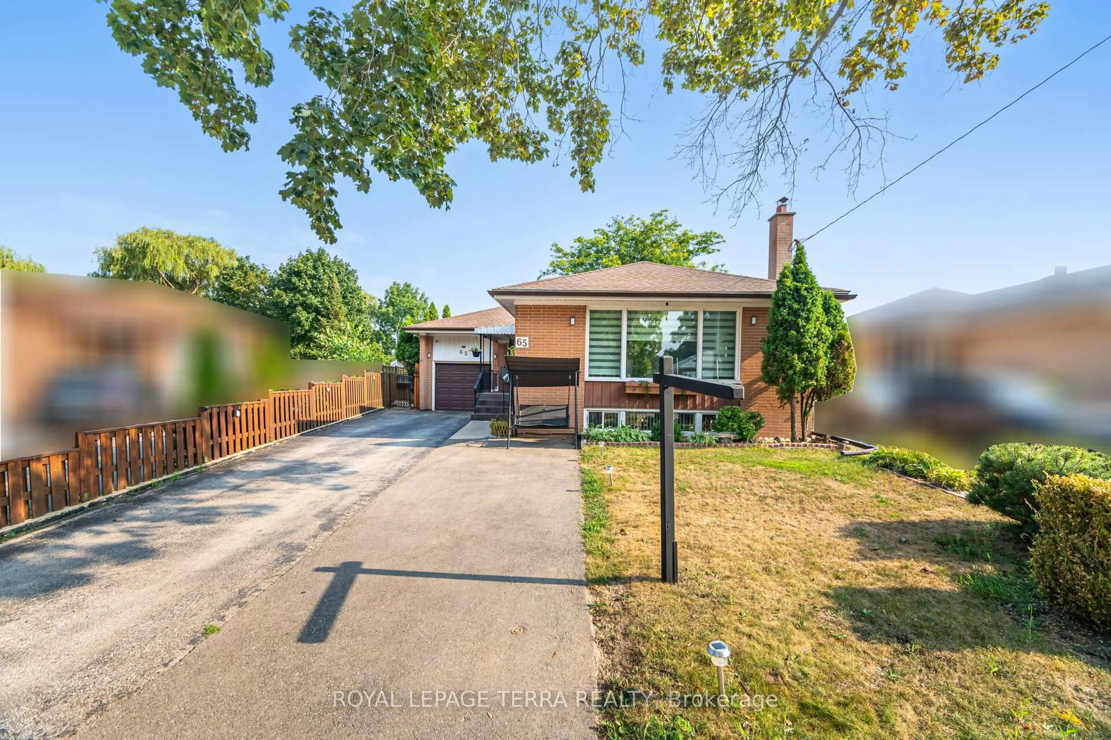 Home with brick exterior material, street for 65 Alhart Dr, Toronto Ontario M9V 2N1